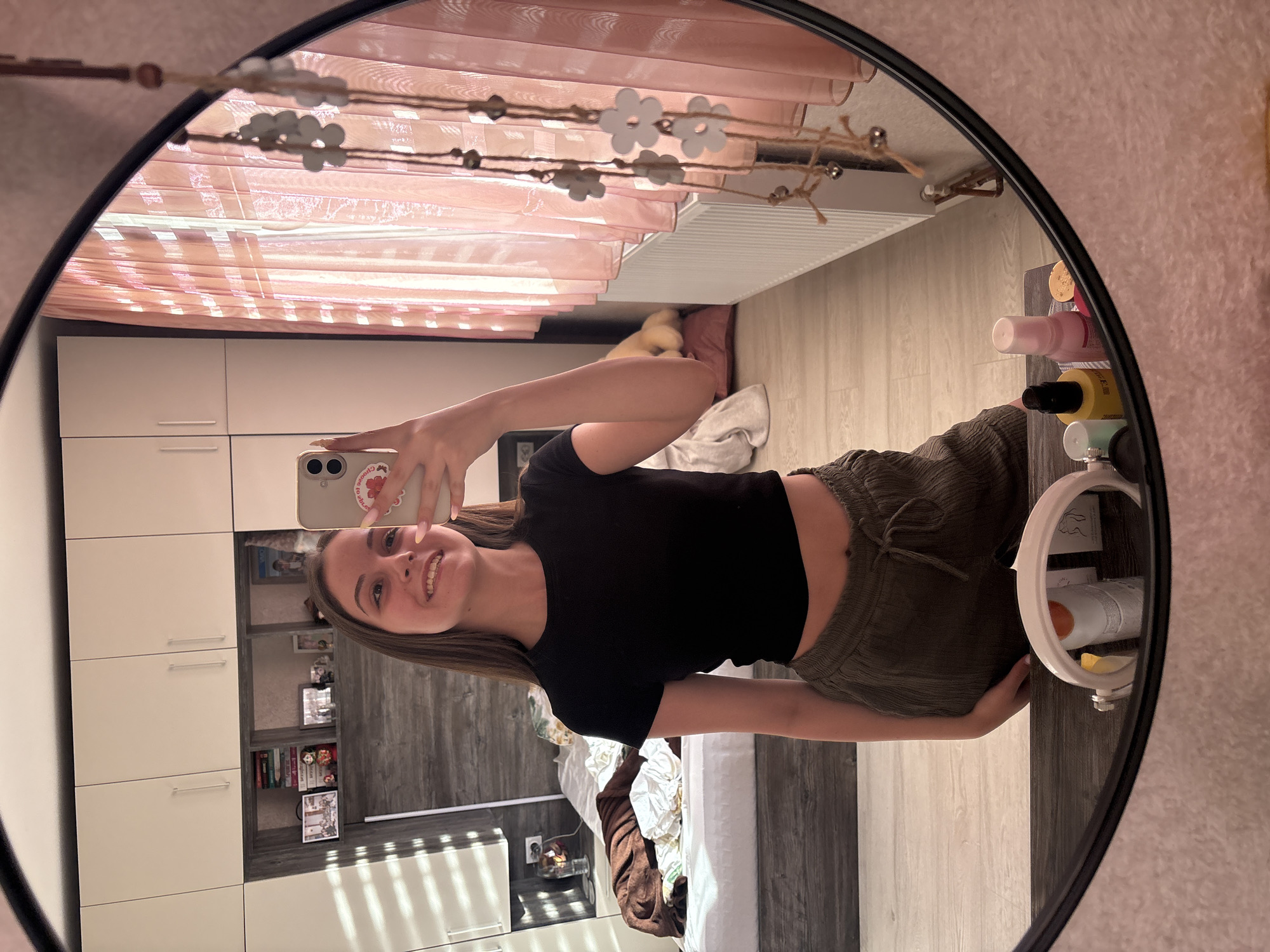 Woman takes mirror selfie in bedroom, Bulgarovo Bulgaria