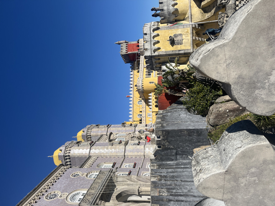 Tourist documents historic palace tour in Sintra, Portugal
