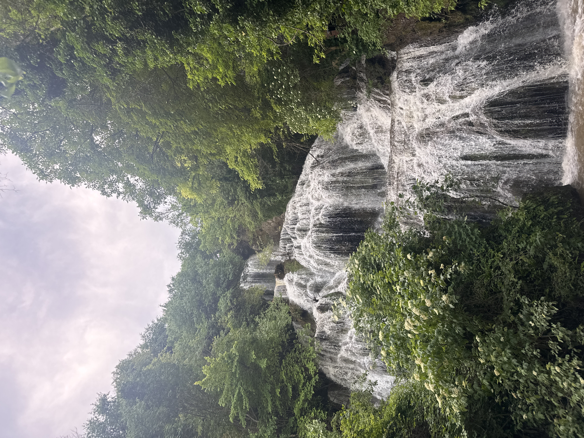 Tourists visit Krushuna Waterfall in Bulgaria, capture scenic views