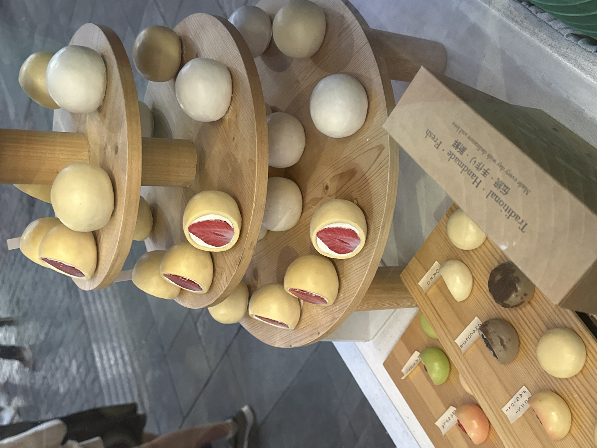 Milan street life and mochi display captured Wednesday afternoon