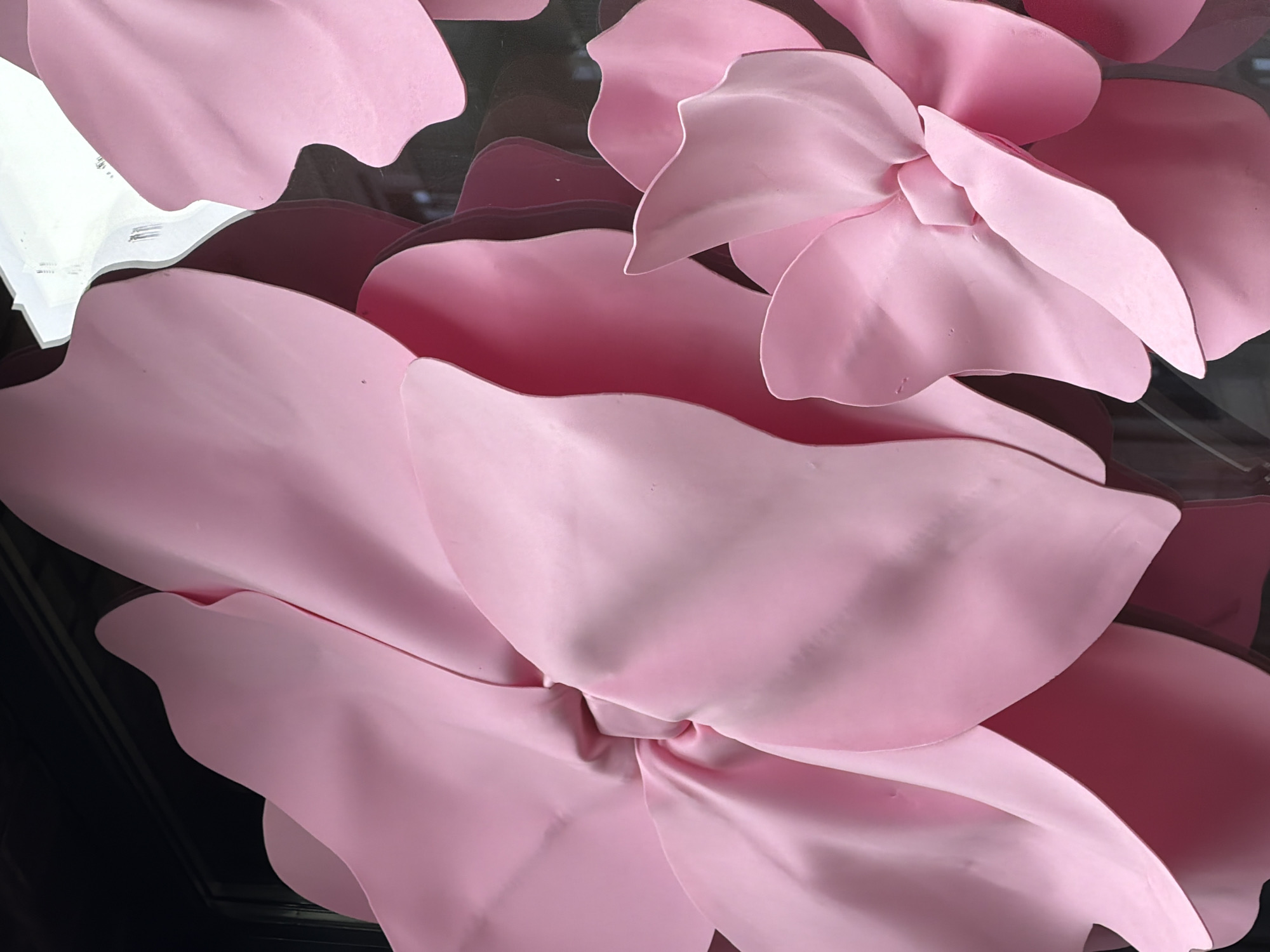 Close-up of layered pale pink artificial flower petals