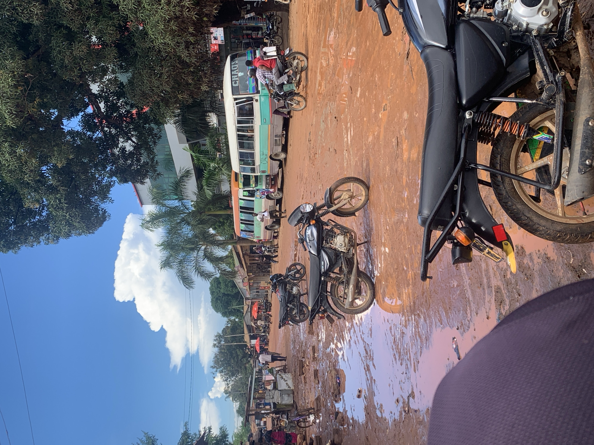 Post-rainfall muddy streets documented across Dar es-Salaam commercial areas