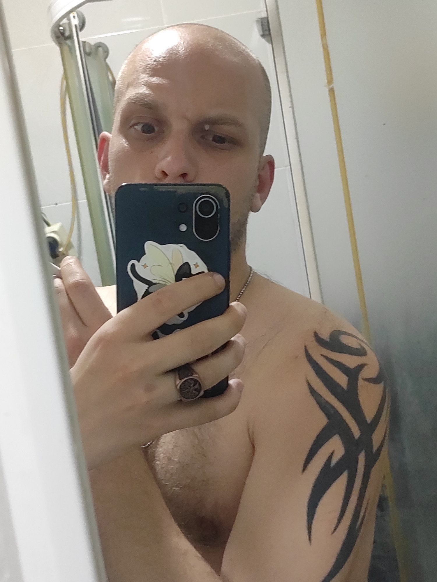 Bathroom selfie and a recycled plastic phone stand in Batumi