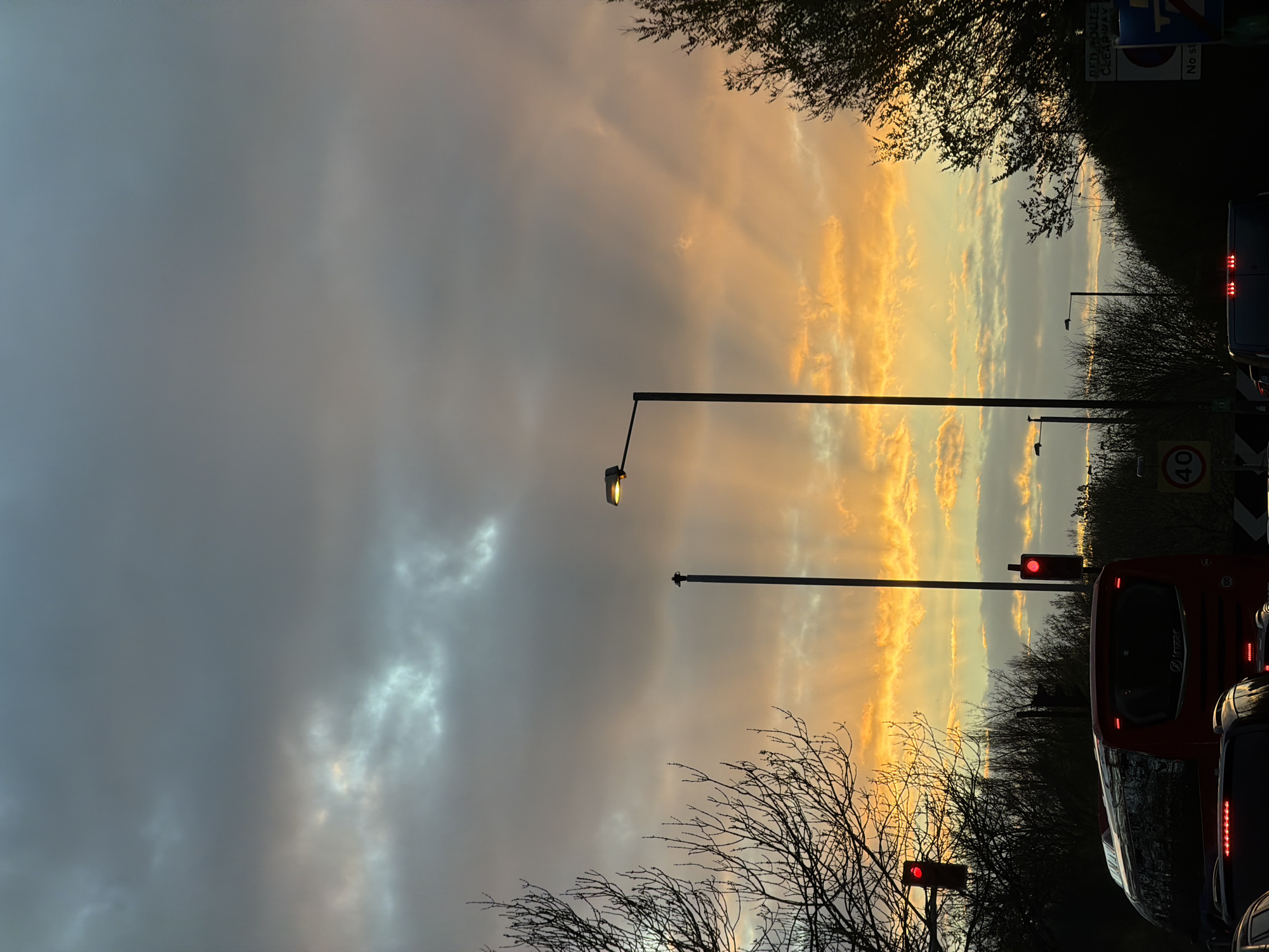London street scene with red traffic light, lamp
