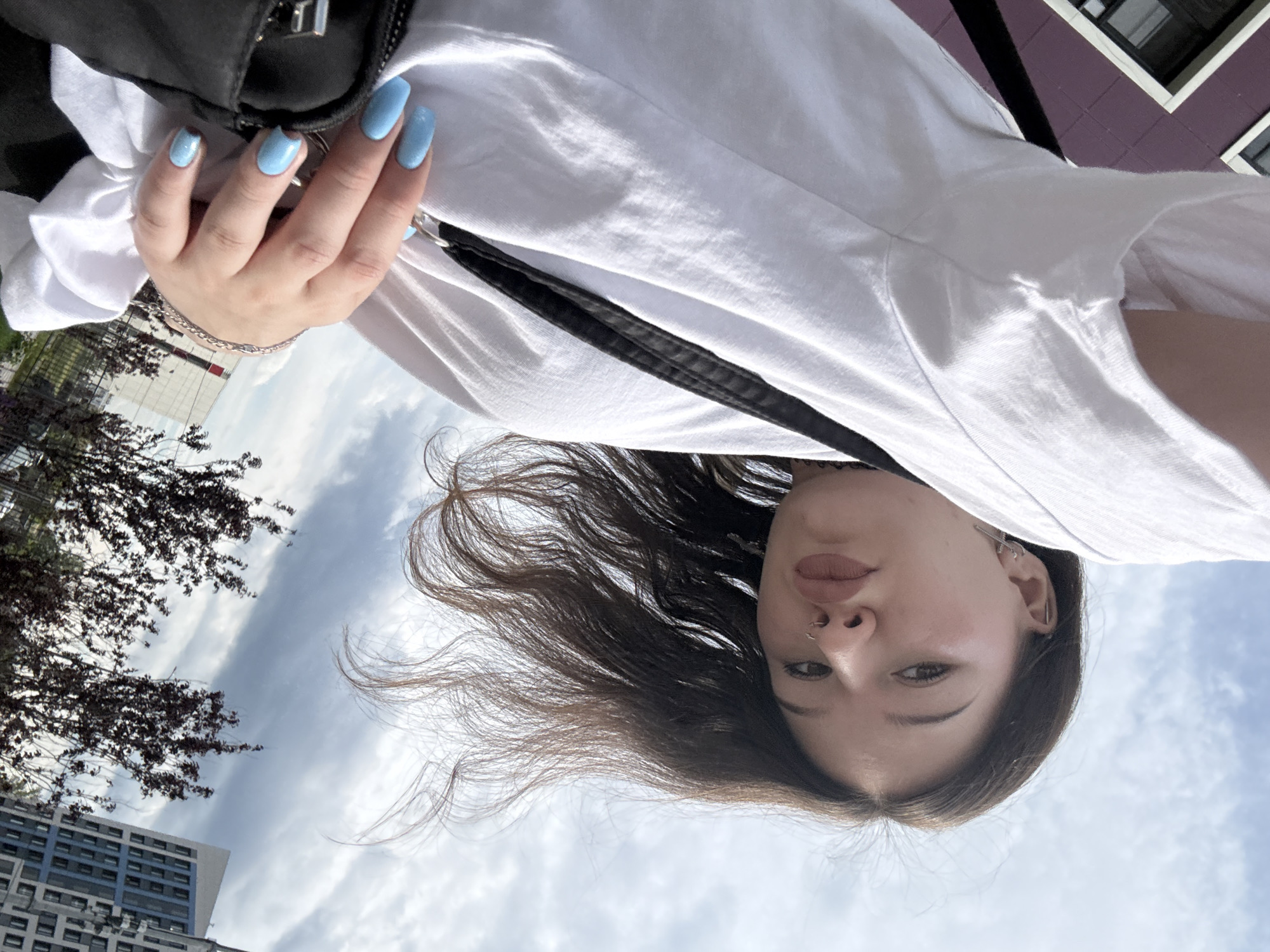 Selfies on a residential street in Sinyavino, summer 2026