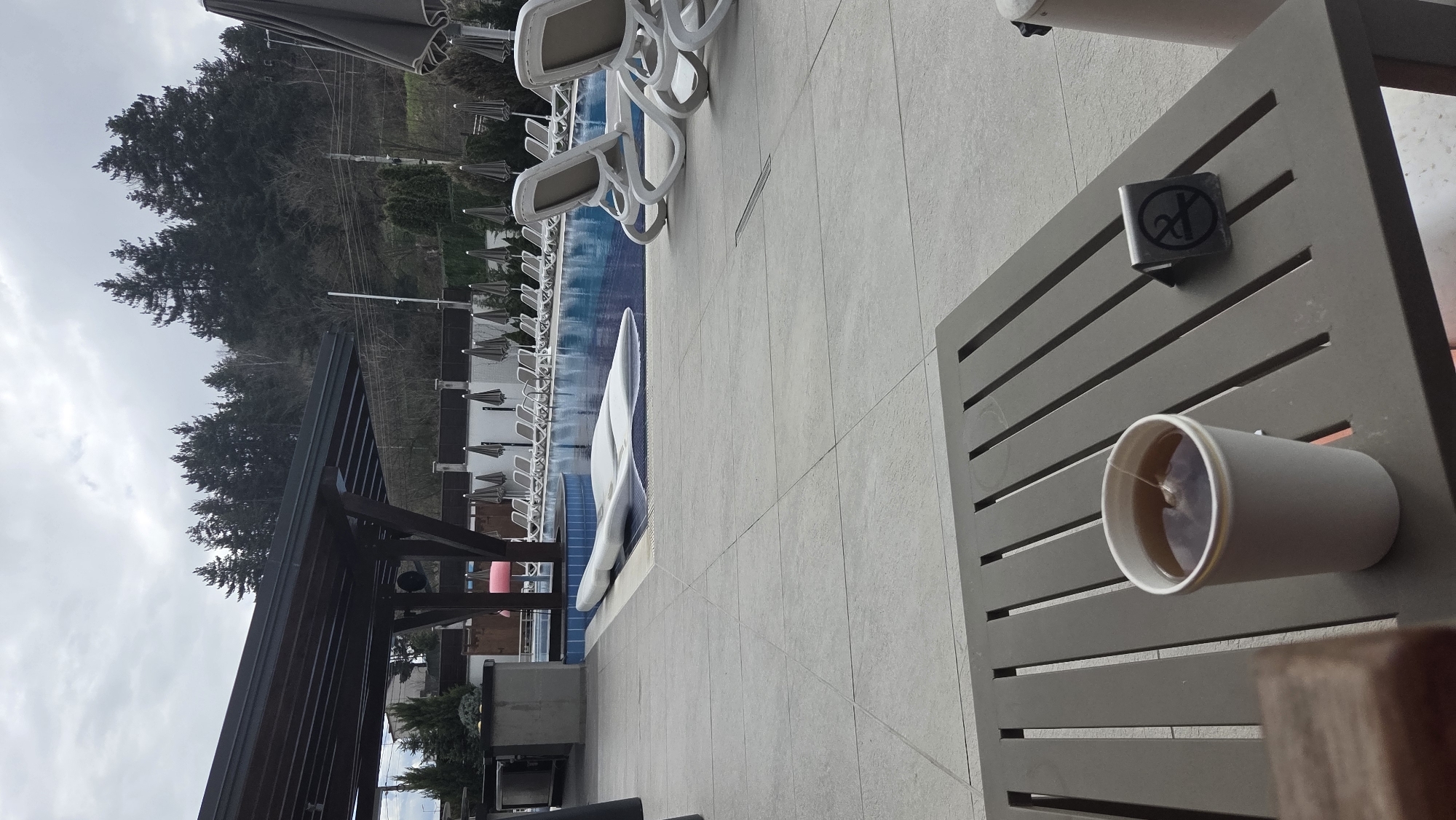 Poolside tea break captured in Bania, Bulgaria