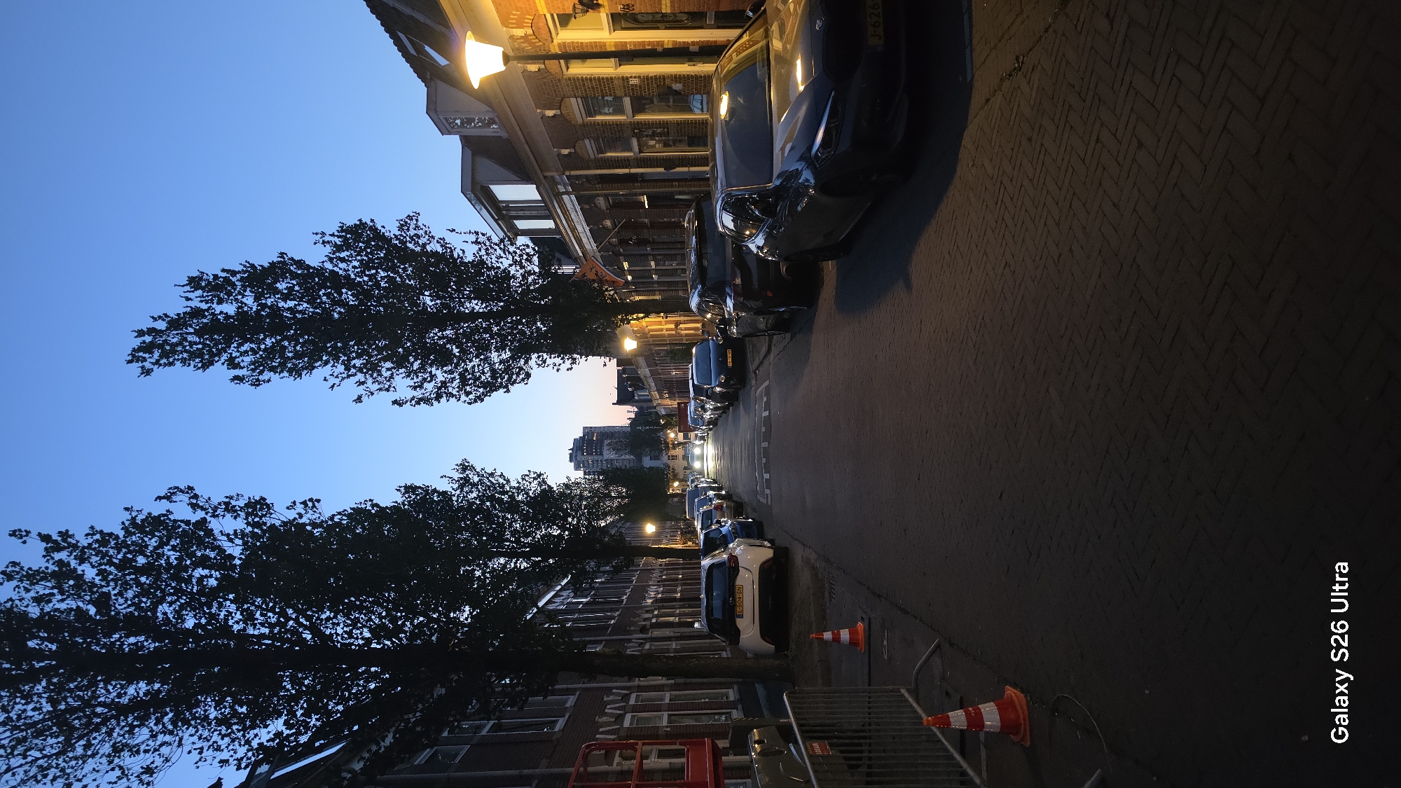 Vlaardingen streets and buildings from dusk into night