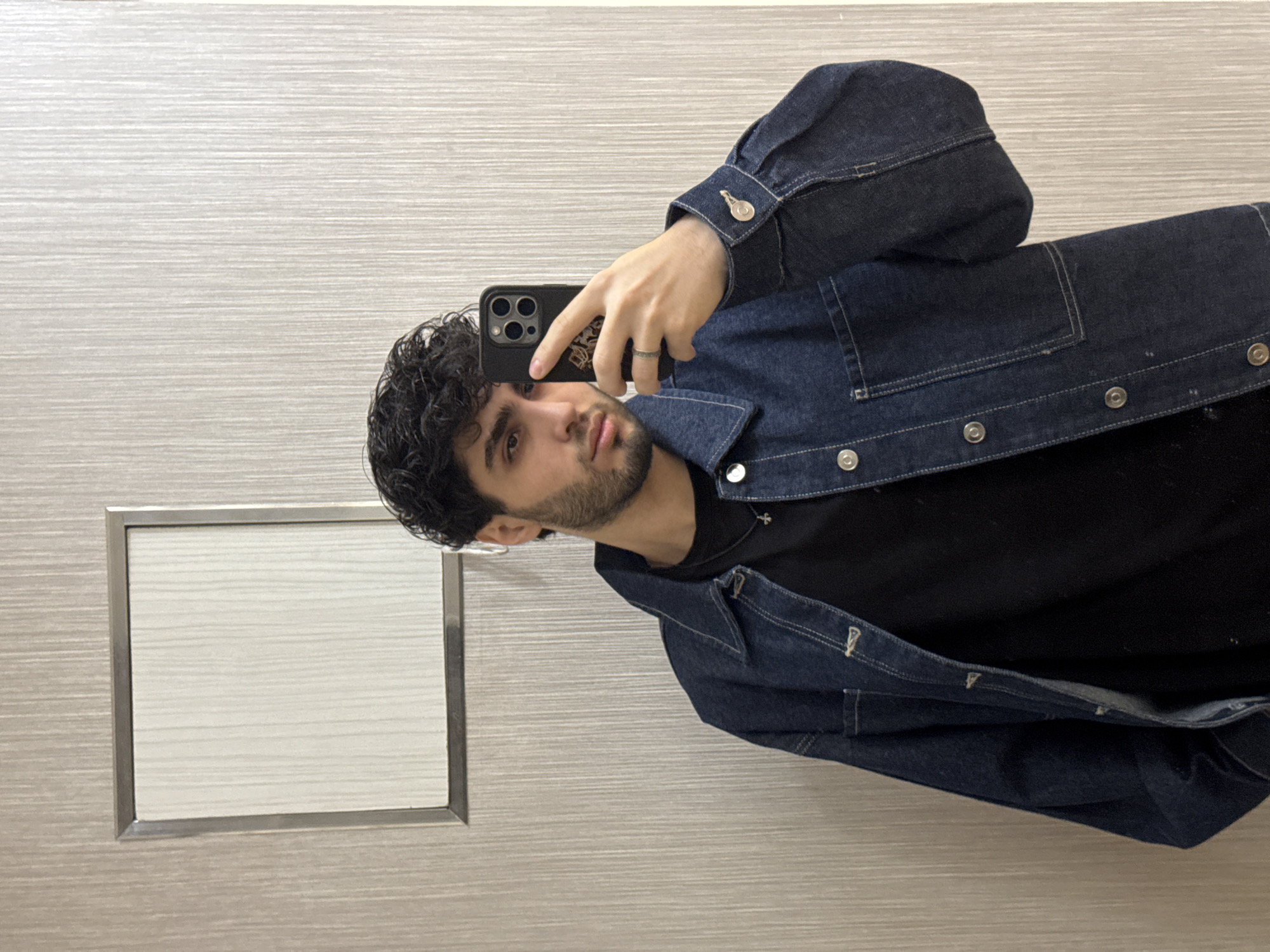 Young man takes bathroom selfies in Yerevan