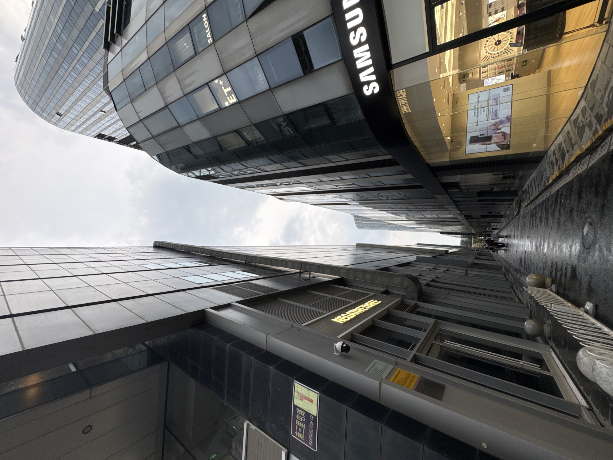 Chaoyang District's commercial skyline from afternoon into night