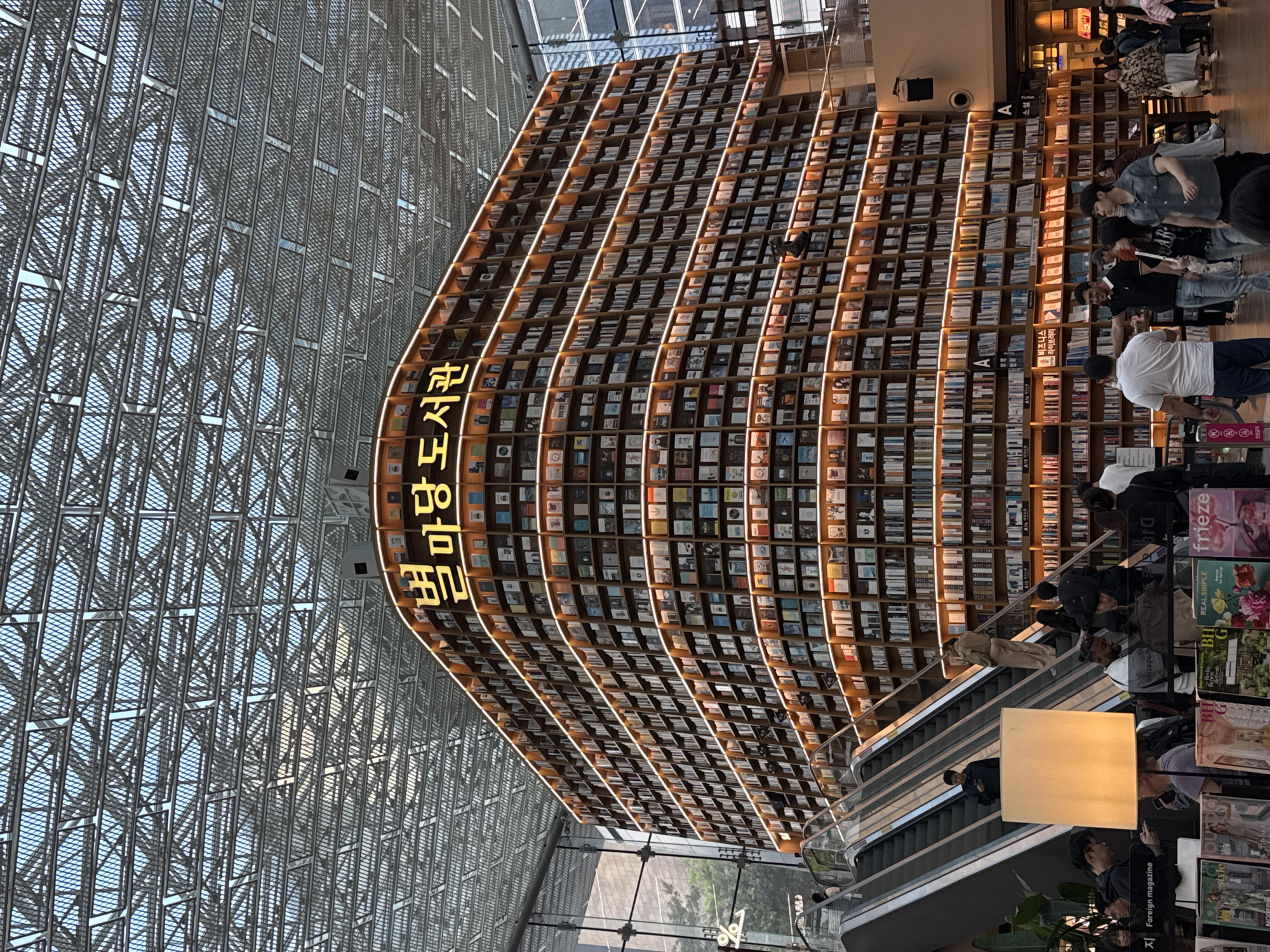 Visitors capture Seoul's iconic Starfield Library towering bookshelves
