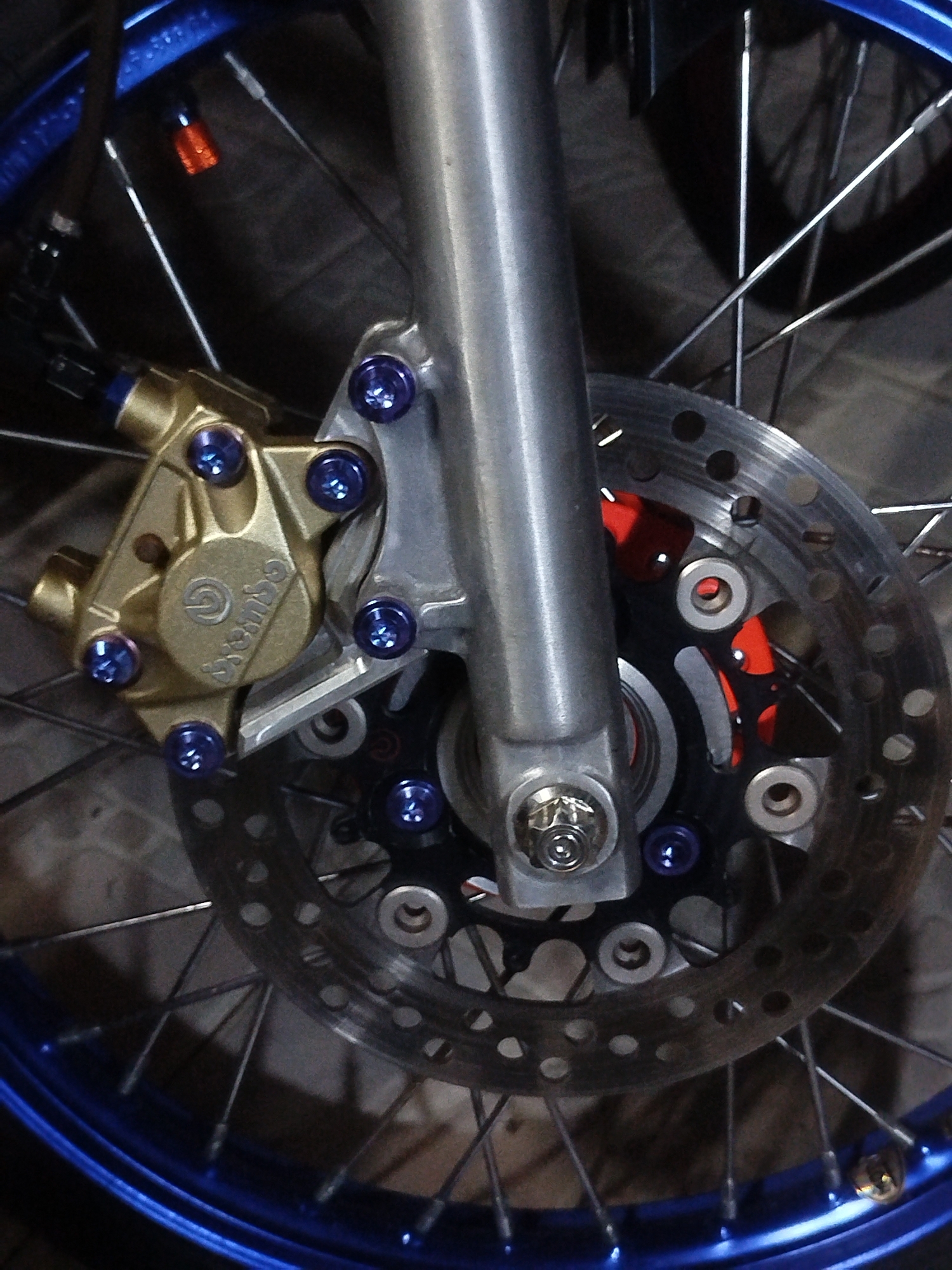 Custom motorcycle repairs and builds underway in a Si Sunthon workshop