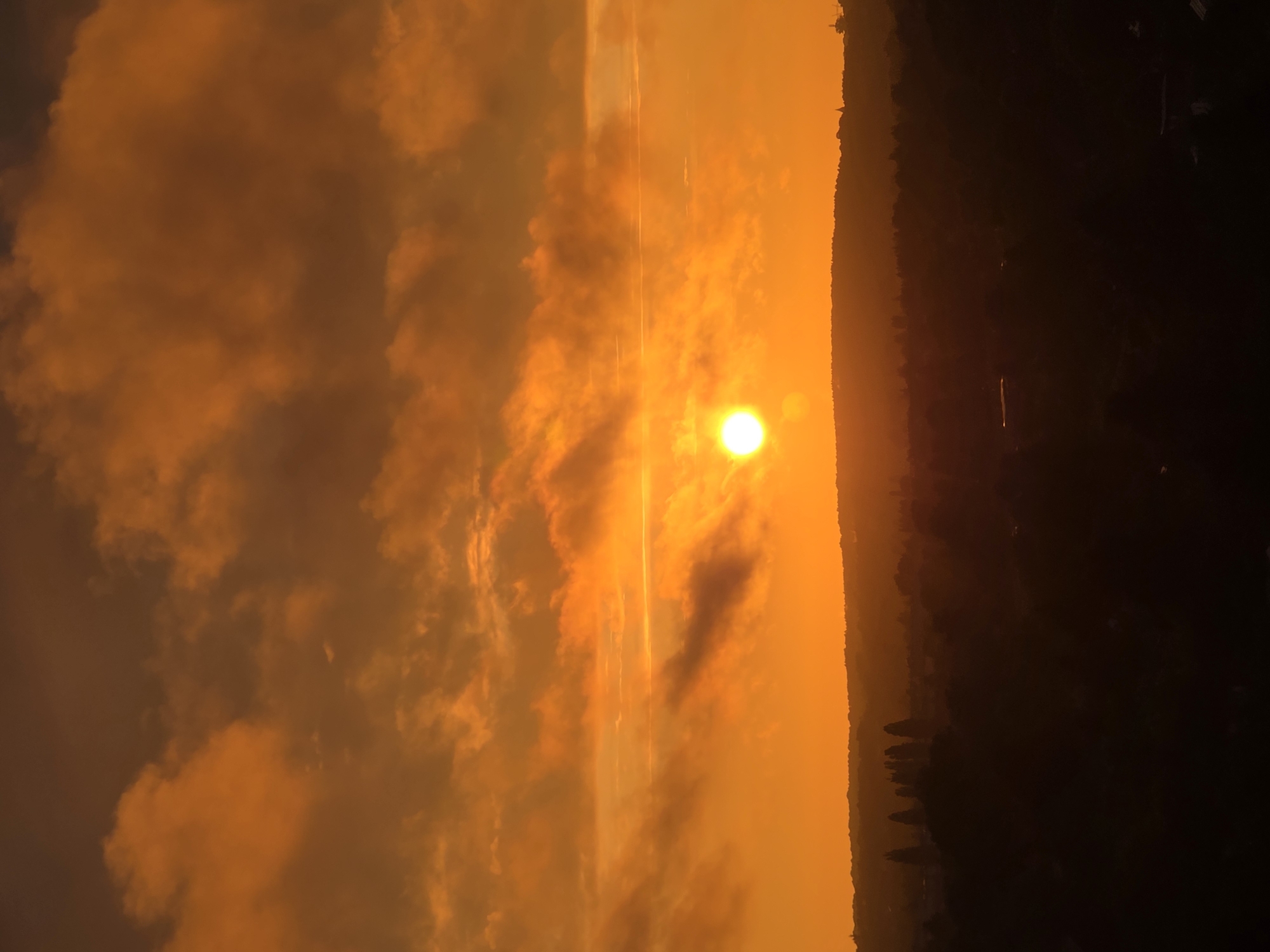 Vivid orange sunset over the Szczecin skyline