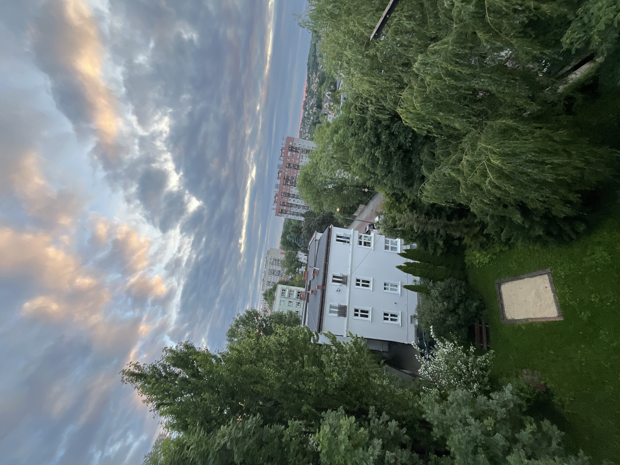 Golden hour over a hillside city, multiple angles
