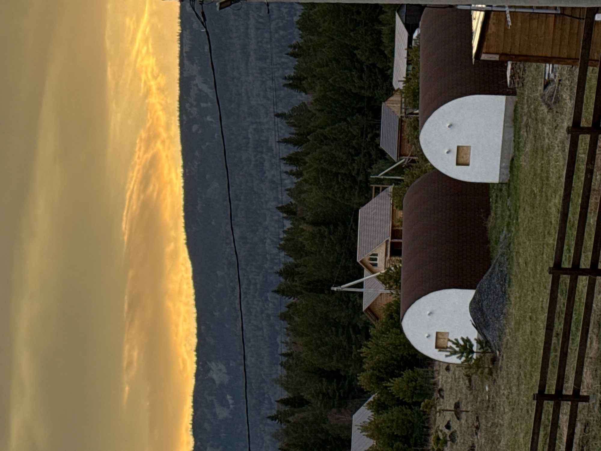 Sunset documentation of rural Tyulyuk landscape with domed structures