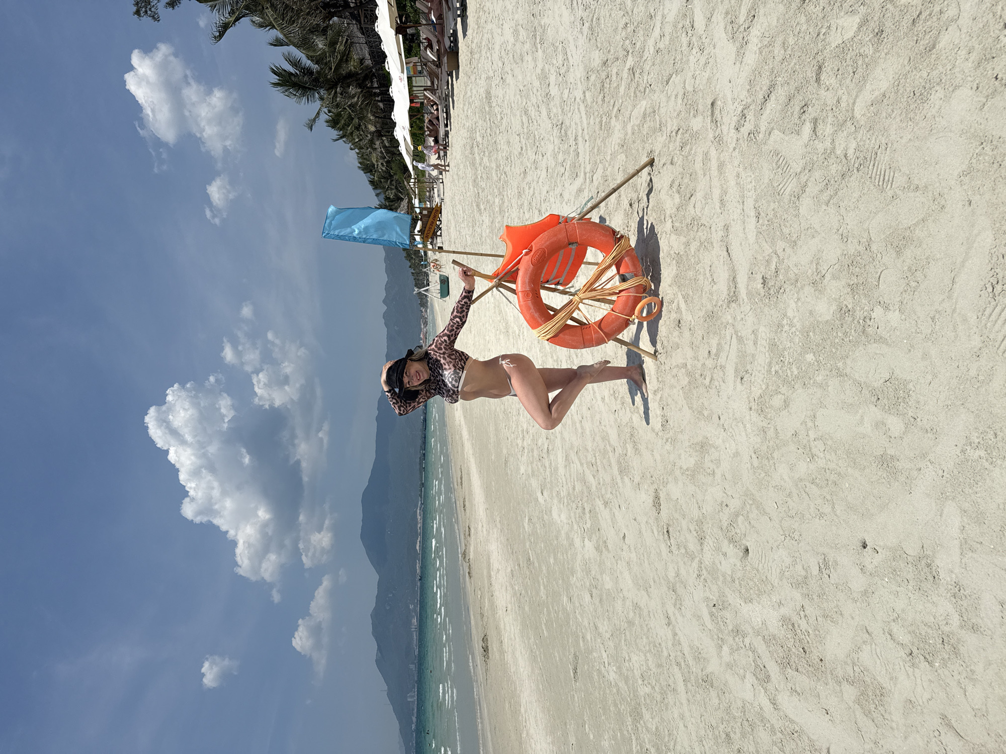 Woman enjoys early morning beach visit in Vietnam