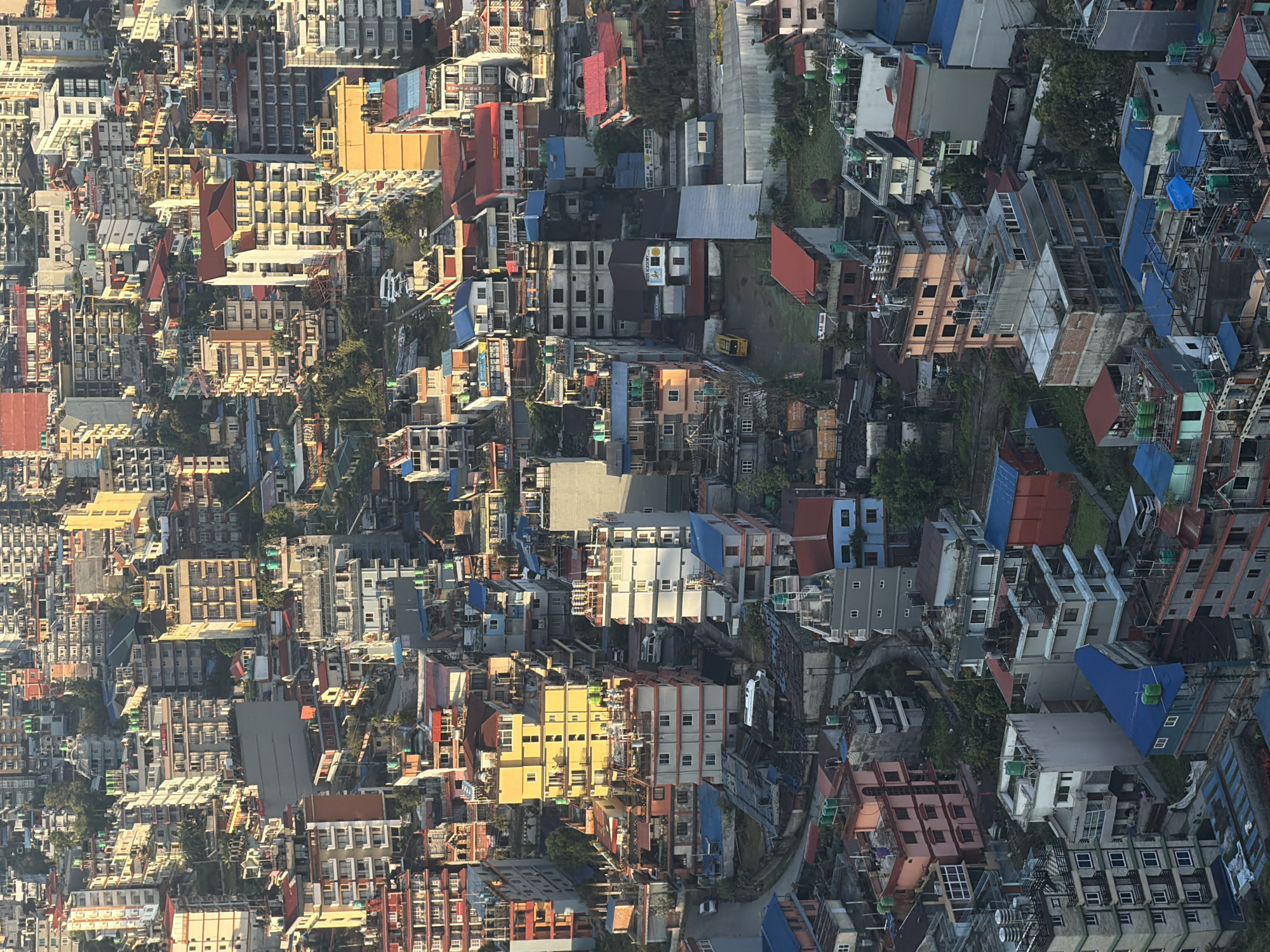 Foggy aerial view captured over Pokhara's urban landscape