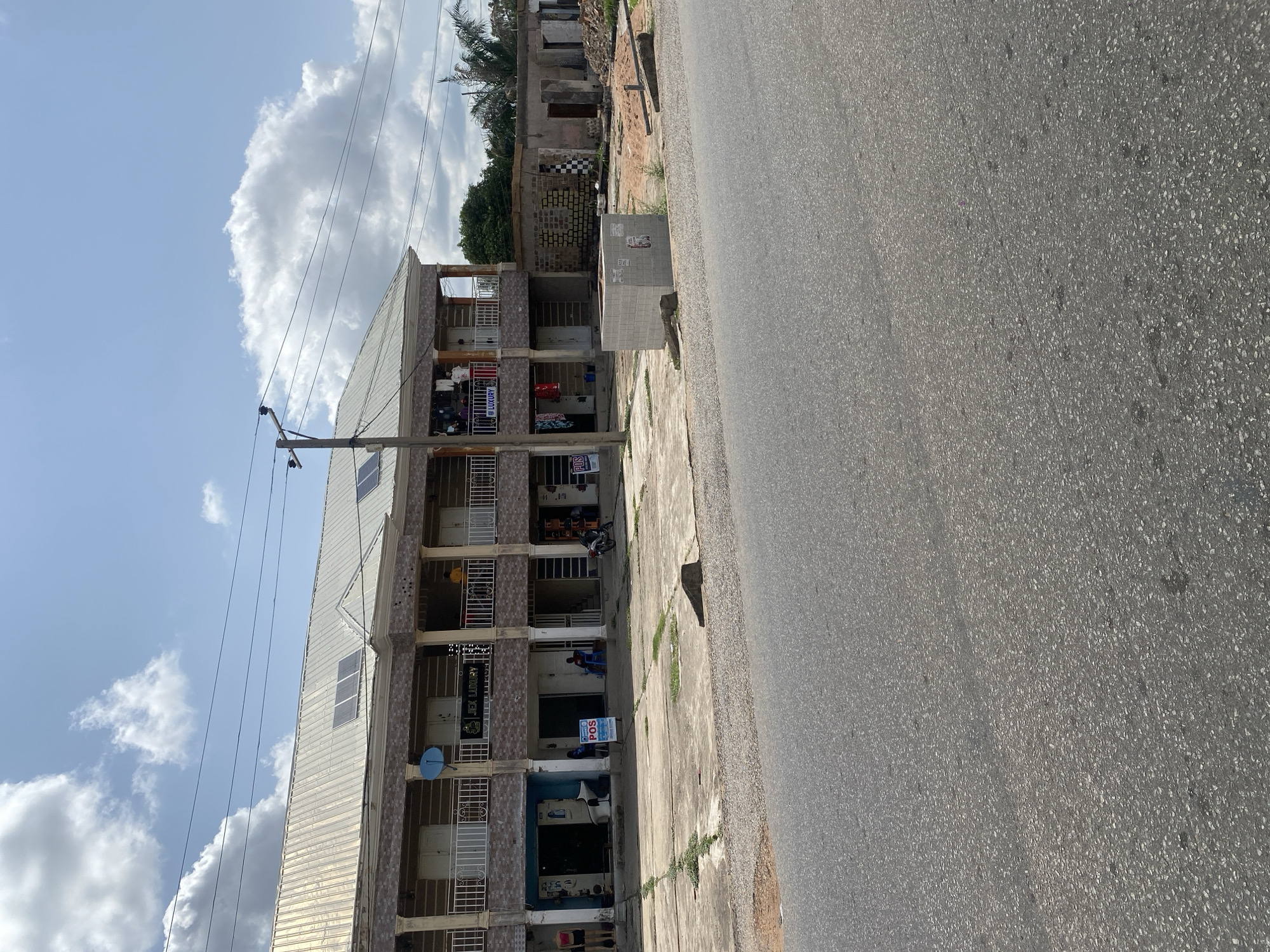 Street-level slice of daily life and local commerce in Jalingo