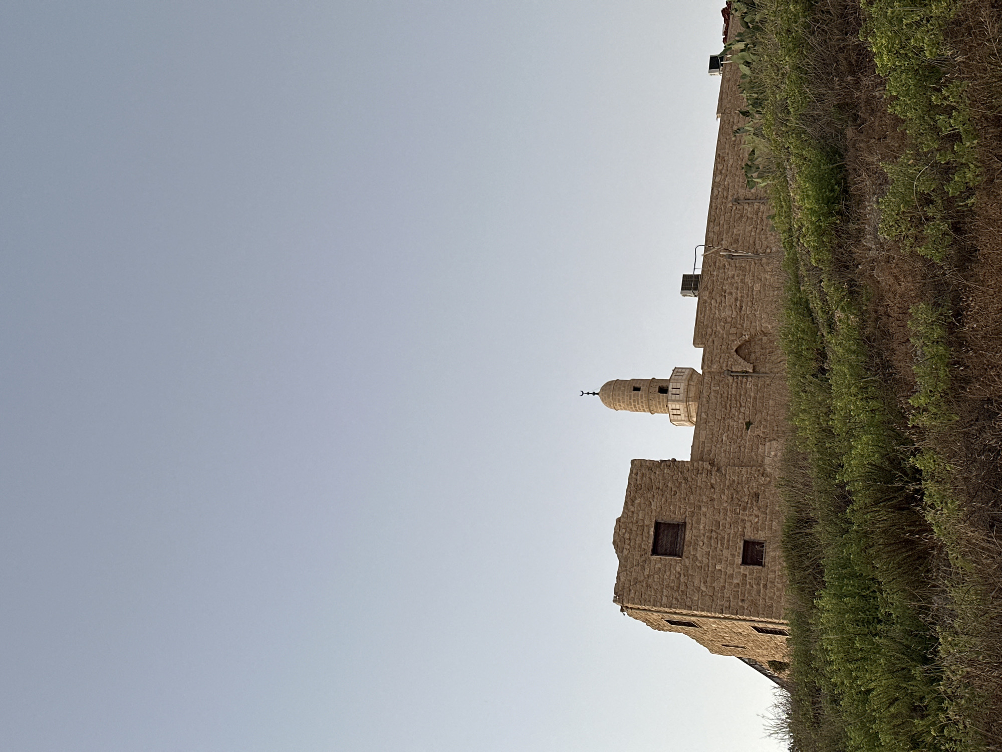 Ancient minaret and beach dusk, Herzliya evening