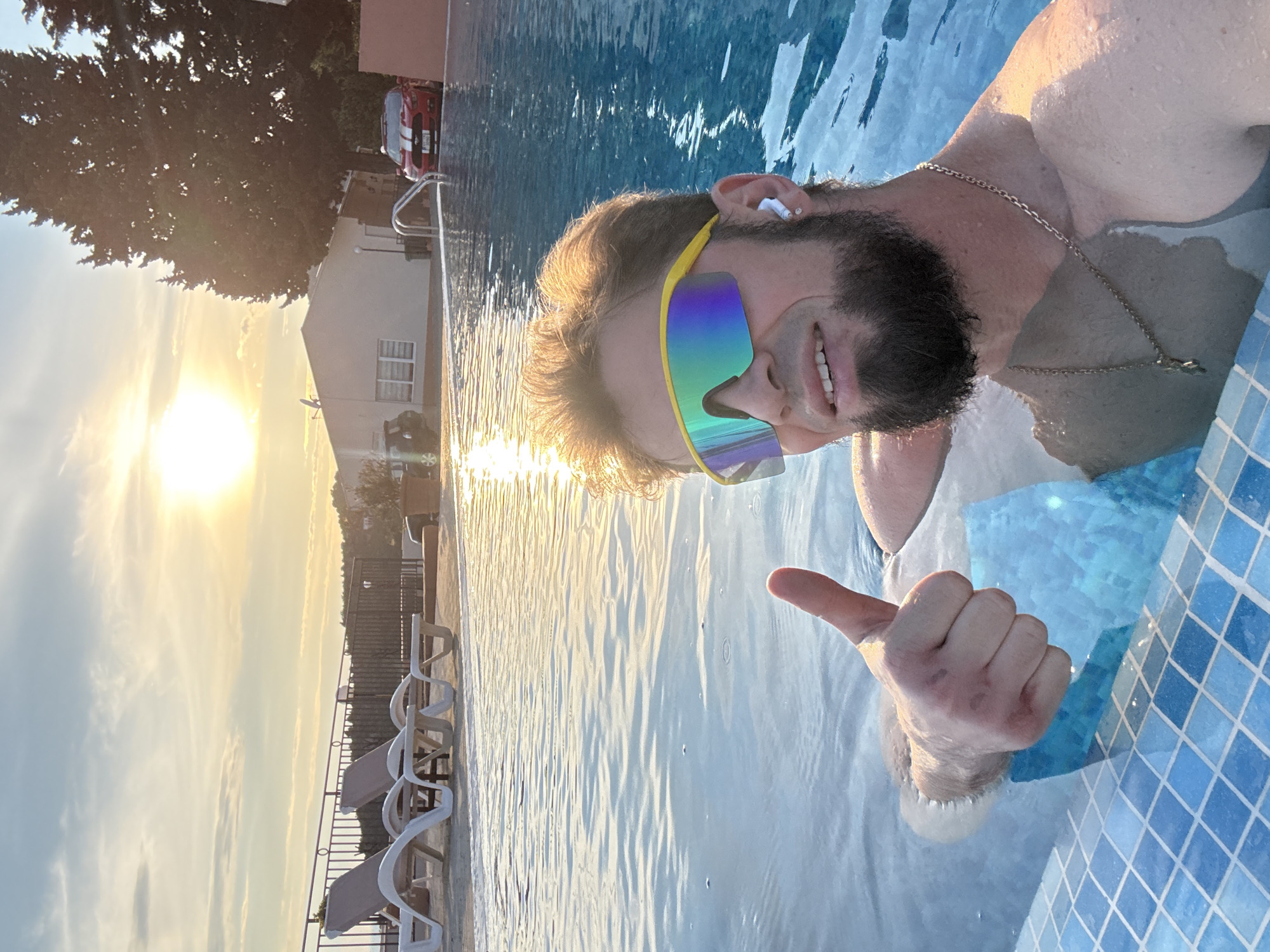 Man enjoys poolside afternoon in Šušanj, Montenegro