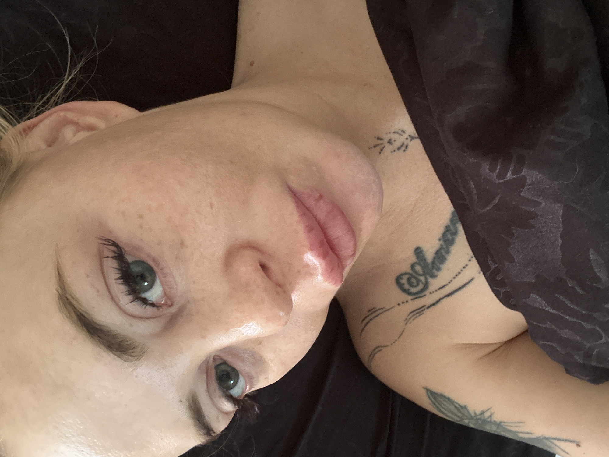 Woman photographed in intimate bedroom setting over 28 minutes