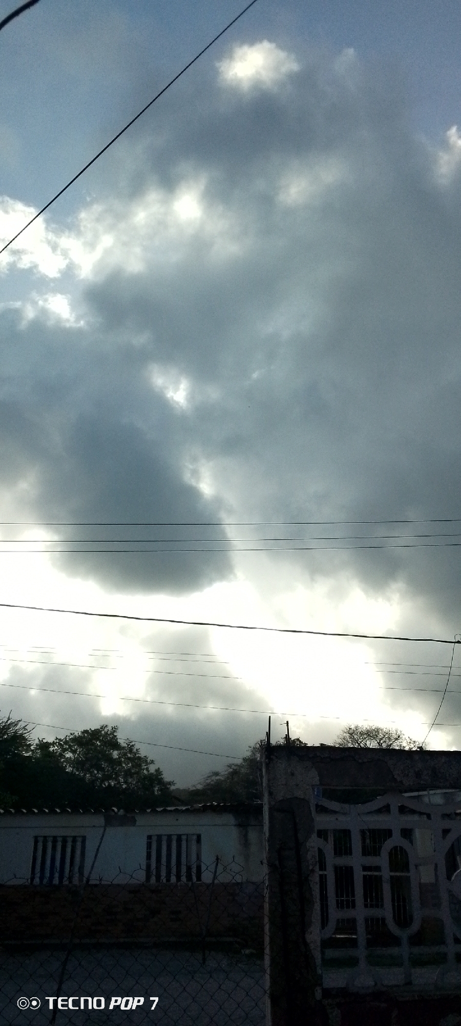 Stormy skies and caged rabbits in Altagracia, Venezuela