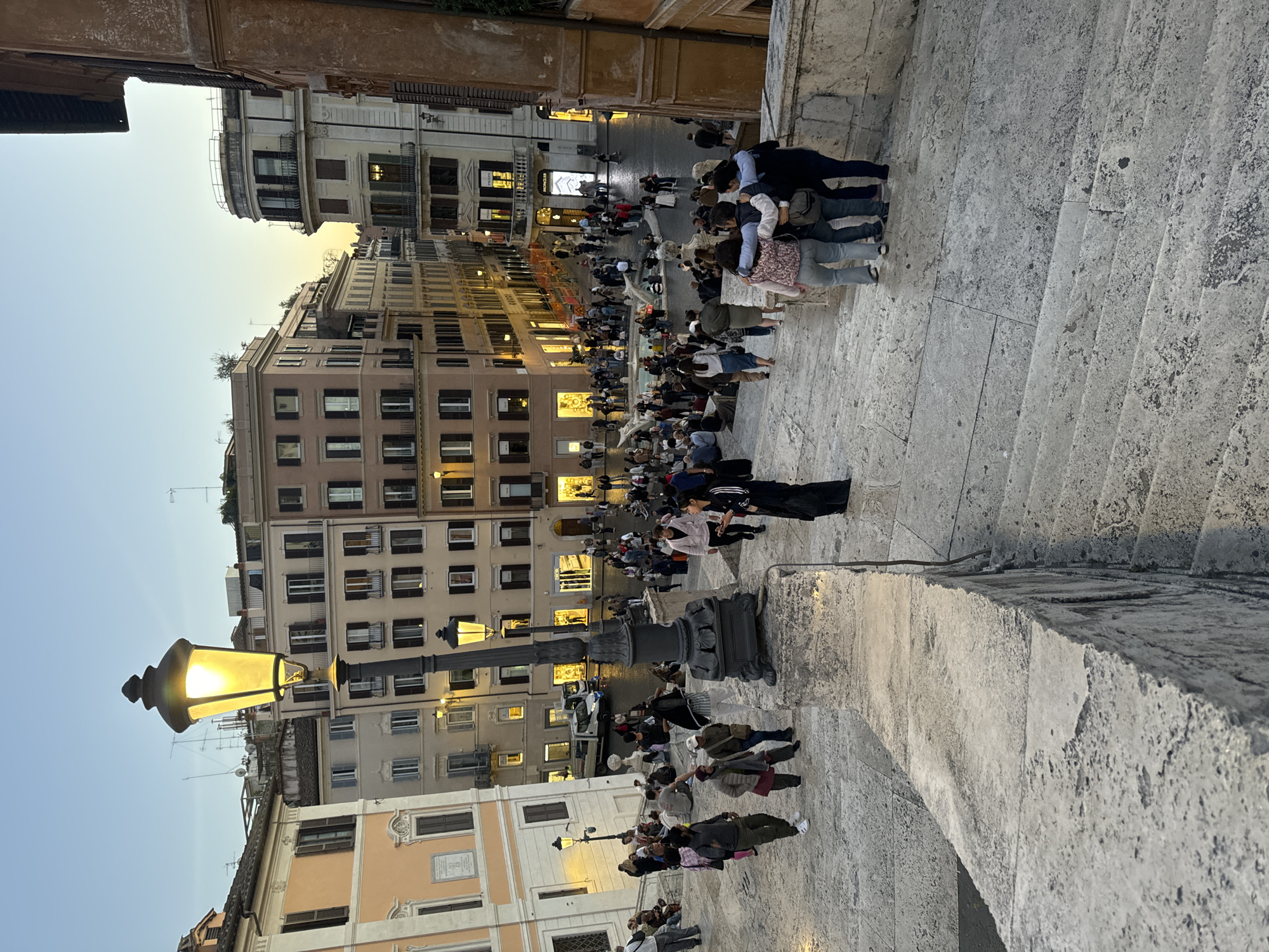 Tourist activity documented at Rome's Spanish Steps during afternoon hours