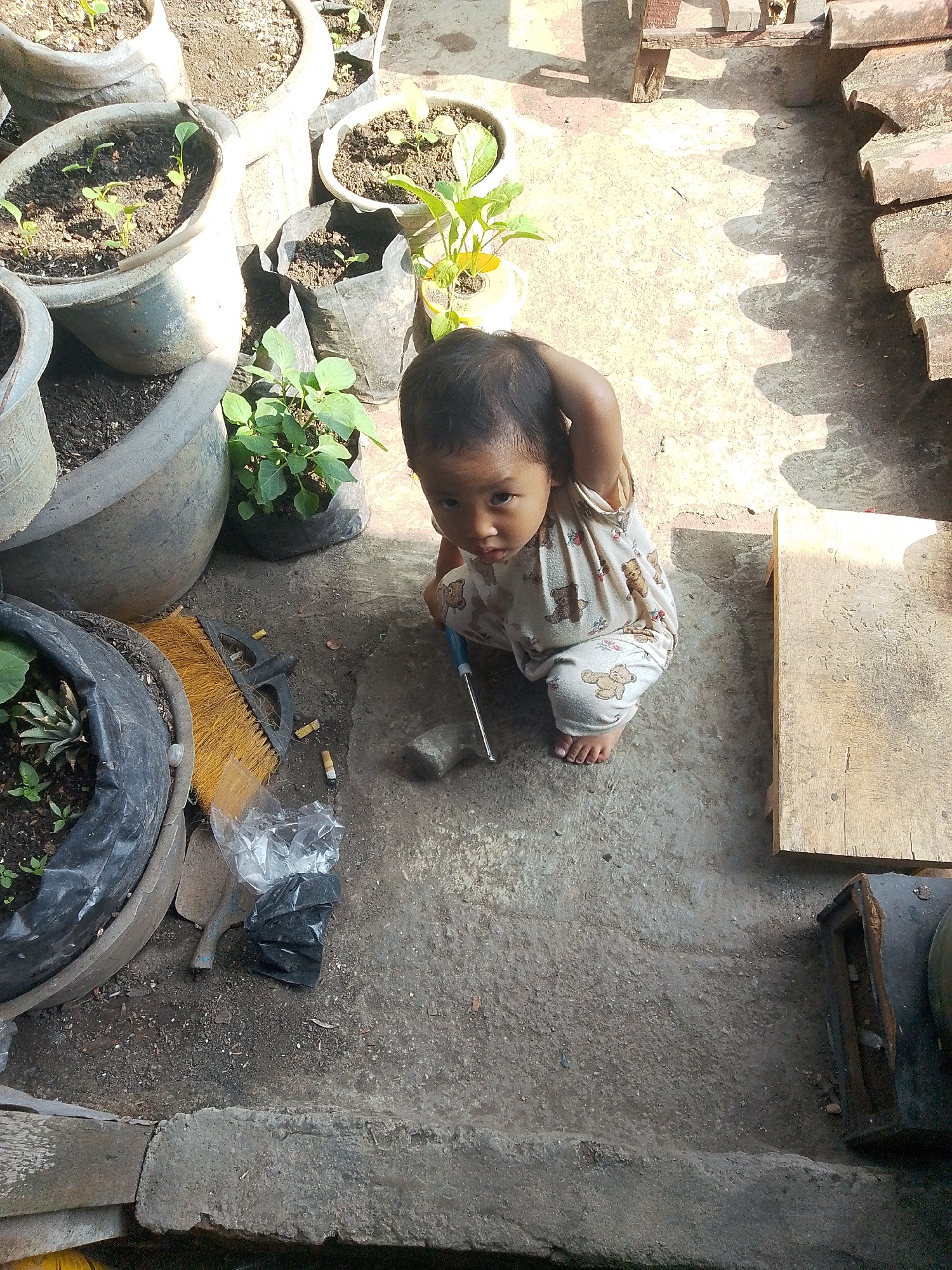 Toddler morning in a Bandar Lampung rooftop garden