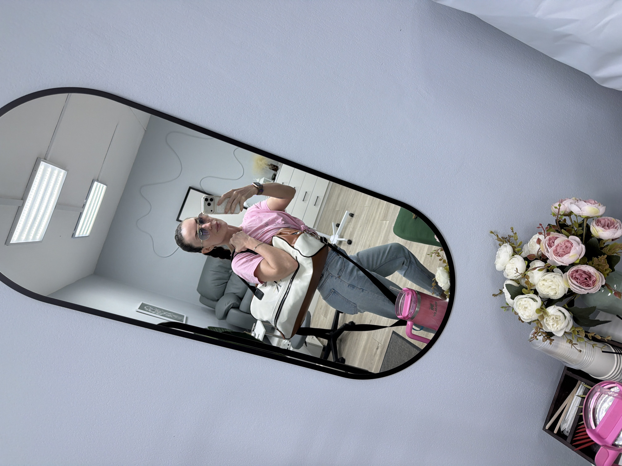Woman documents salon visit with mirror selfies in Perm