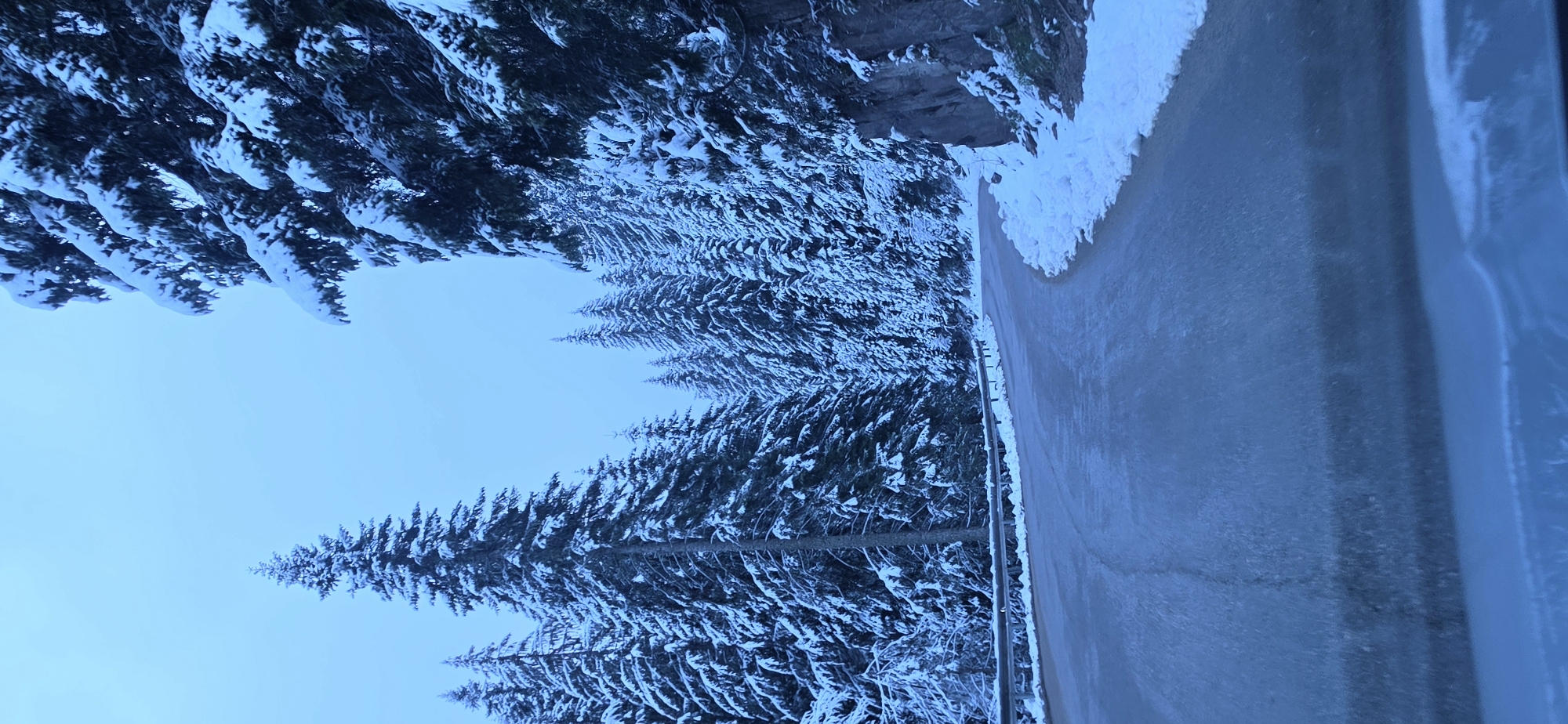 Late spring snow blankets mountain roads in Smolyan, Bulgaria