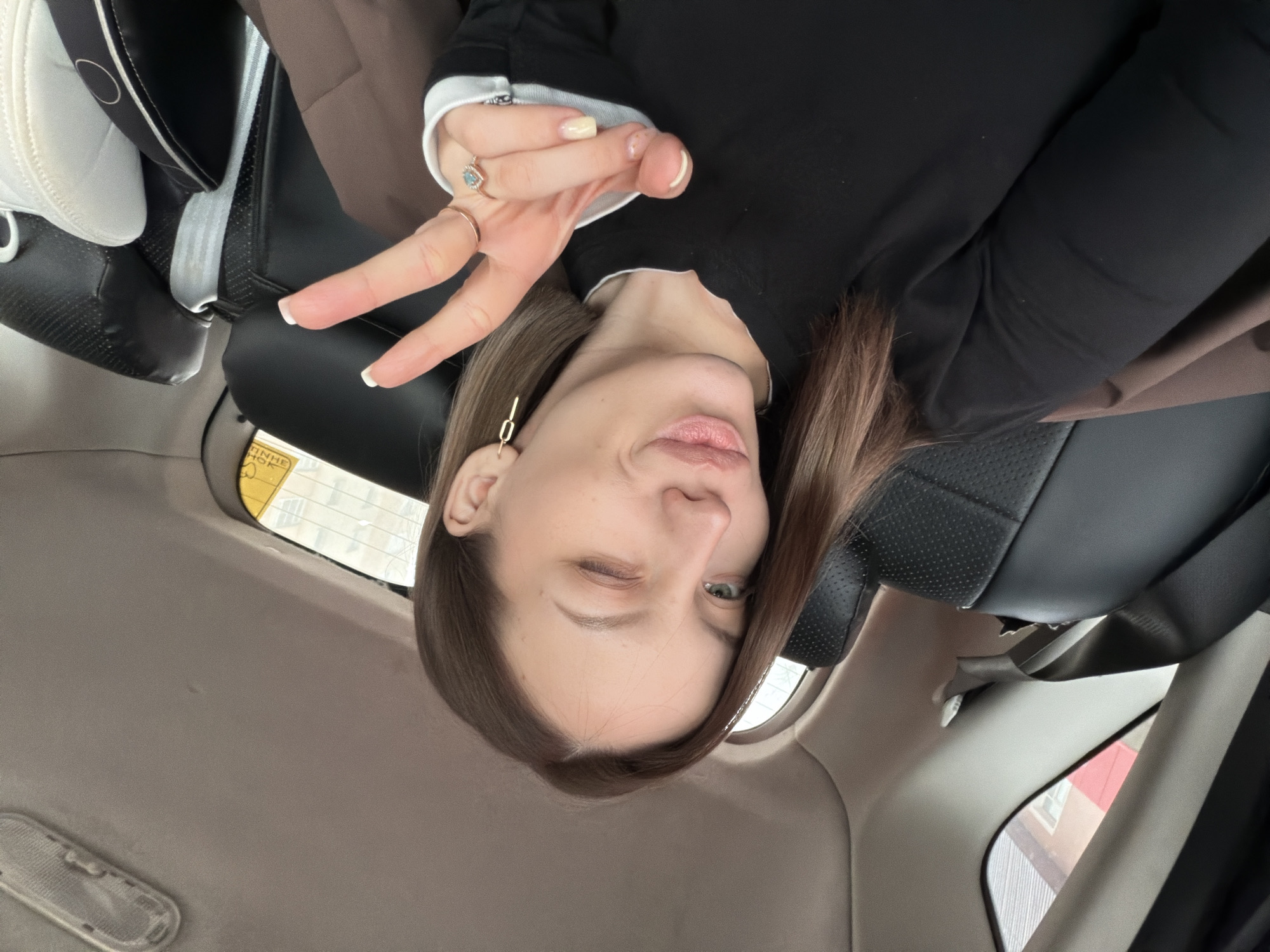 Woman films selfies, children ride scooters on Klin streets