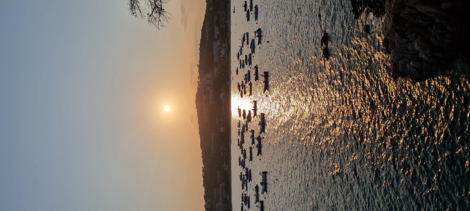 Golden hour over a boat-filled bay in Platja d'Aro