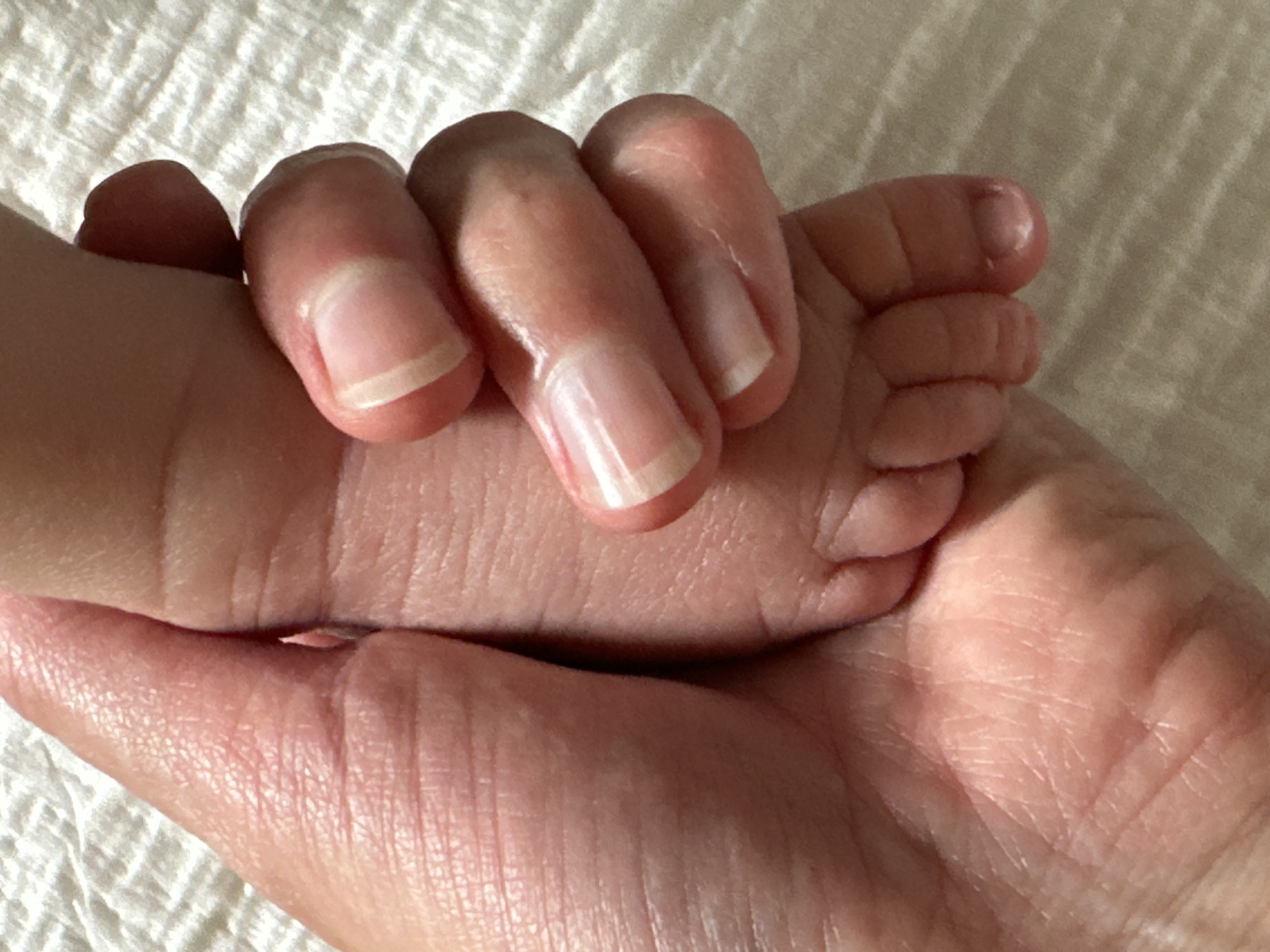 Gentle moment with baby's foot in Wisła