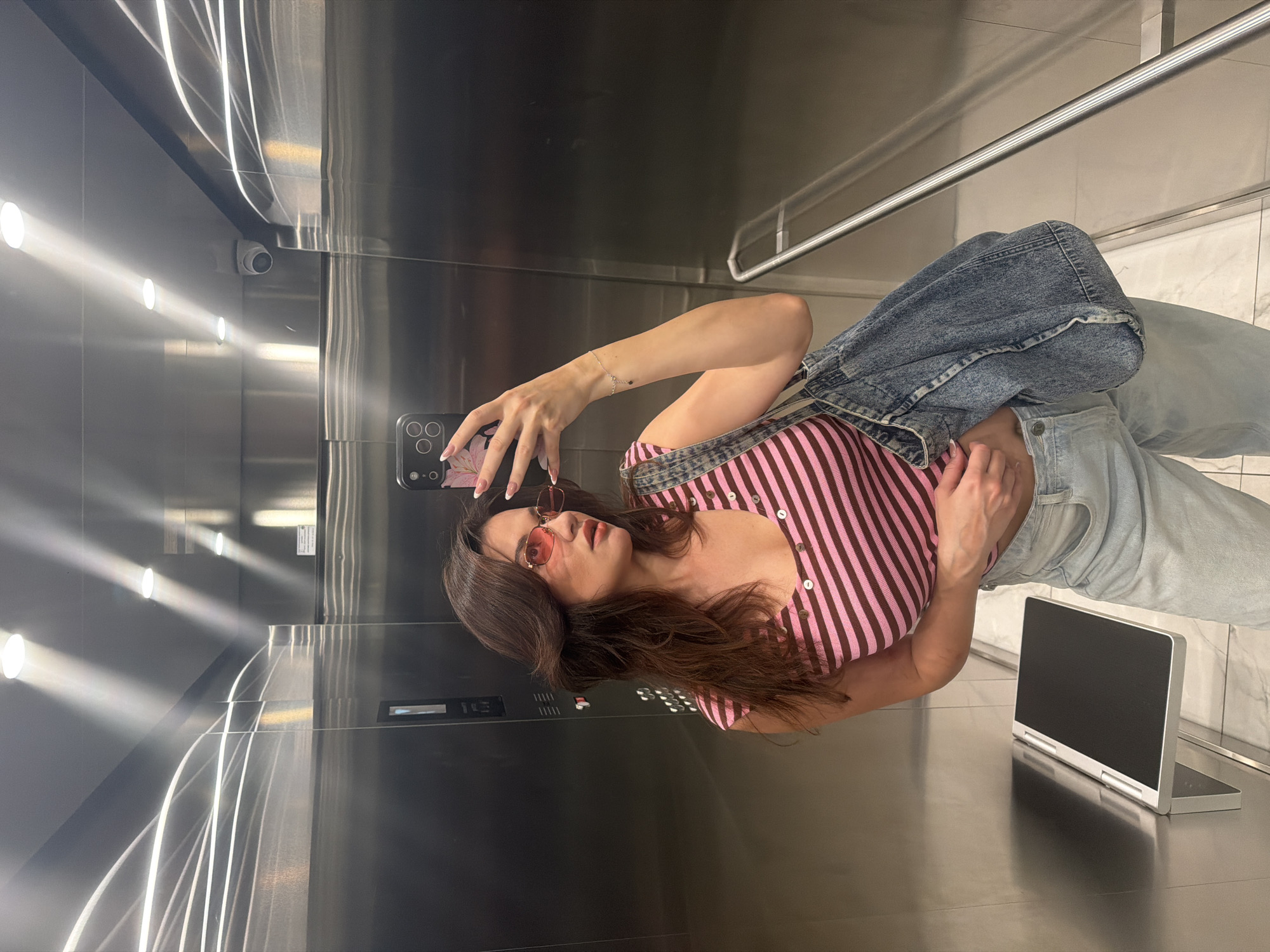 Woman Takes Selfie in Belgrade Elevator