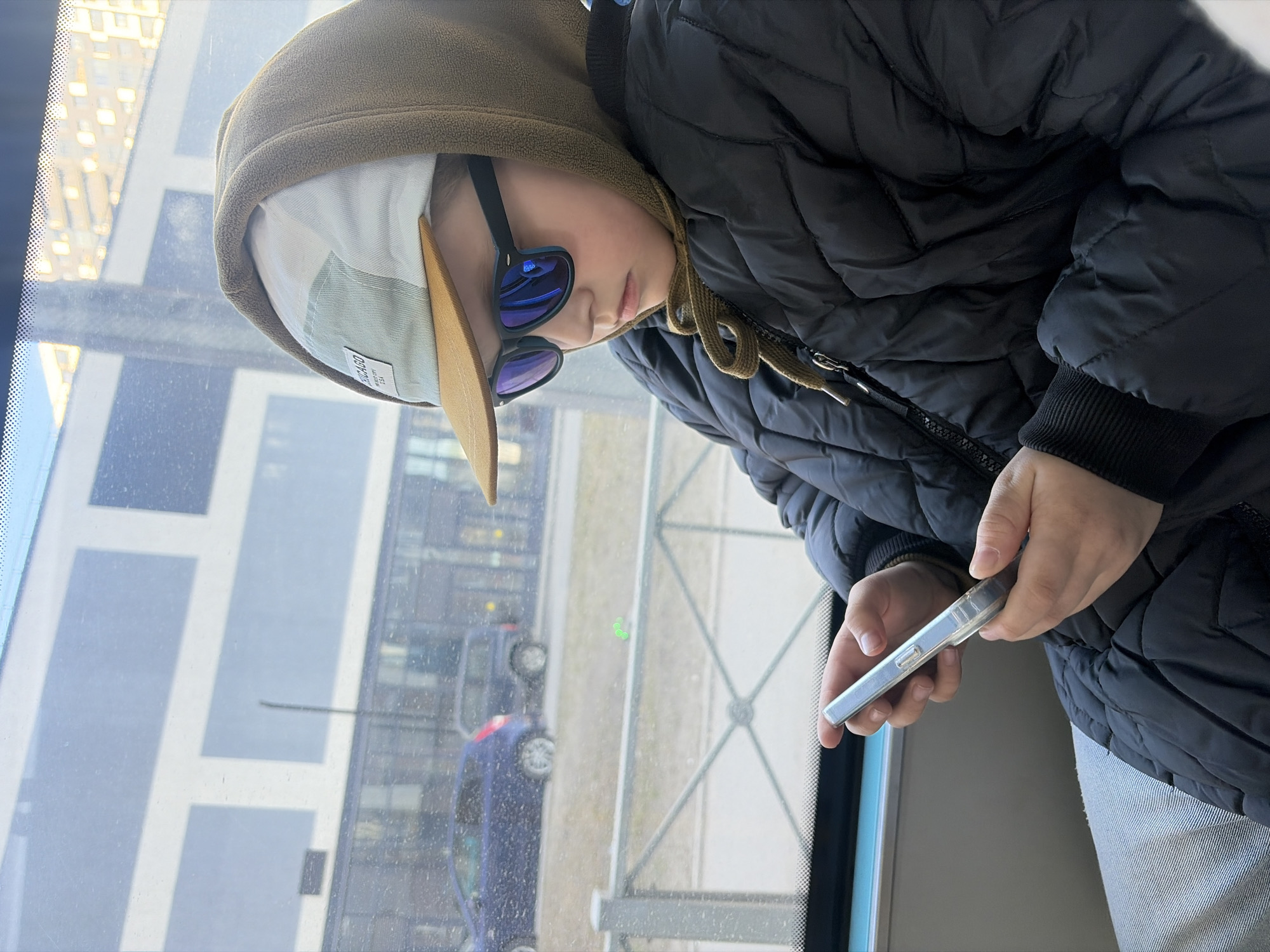 Child with smartphone spotted on Saint Petersburg public transit