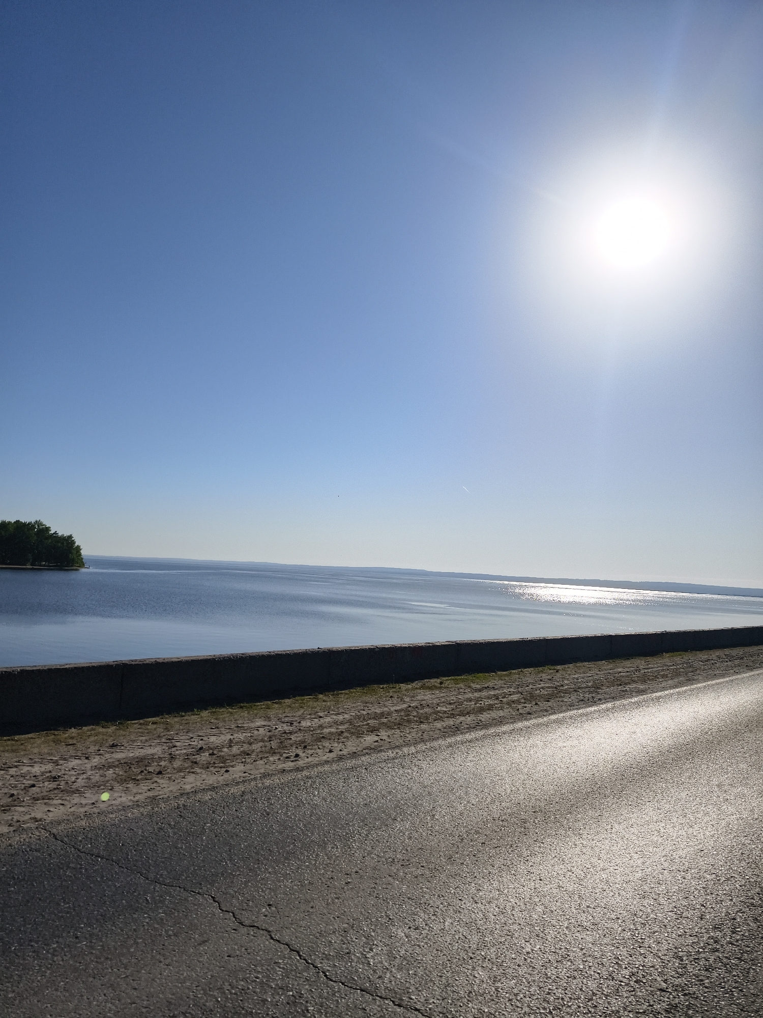 Early morning views of Volga River and roadway in Noviy