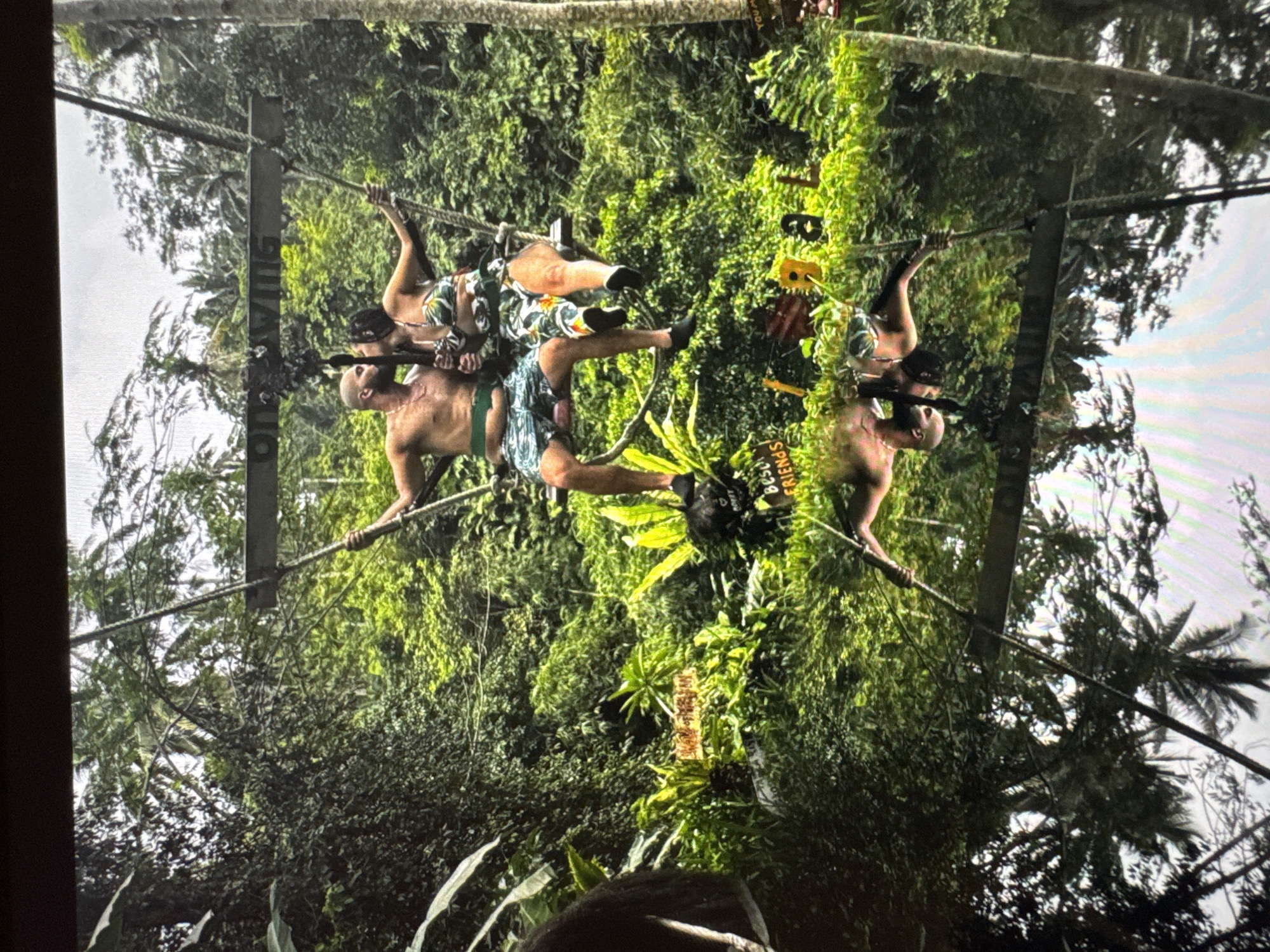 Tourists enjoy waterfall adventures at tropical resort location