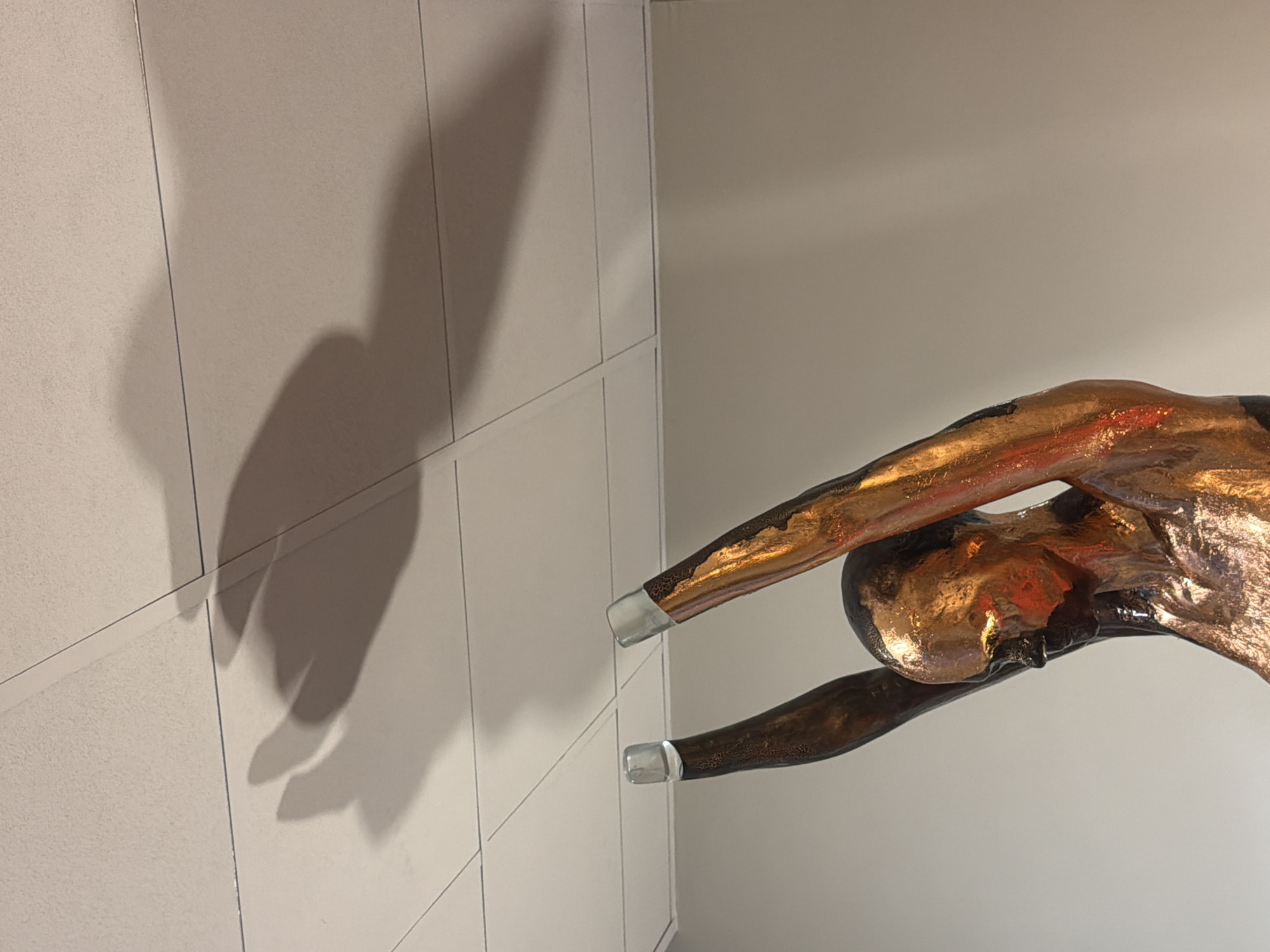 Contemporary art exhibition documented in Milan with sculptures, installations