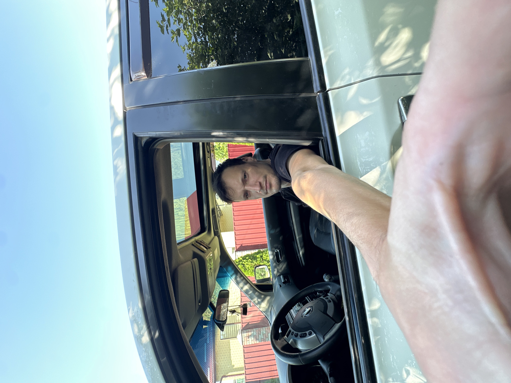 Roadside selfie session in a parked car, Shatava, Ukraine