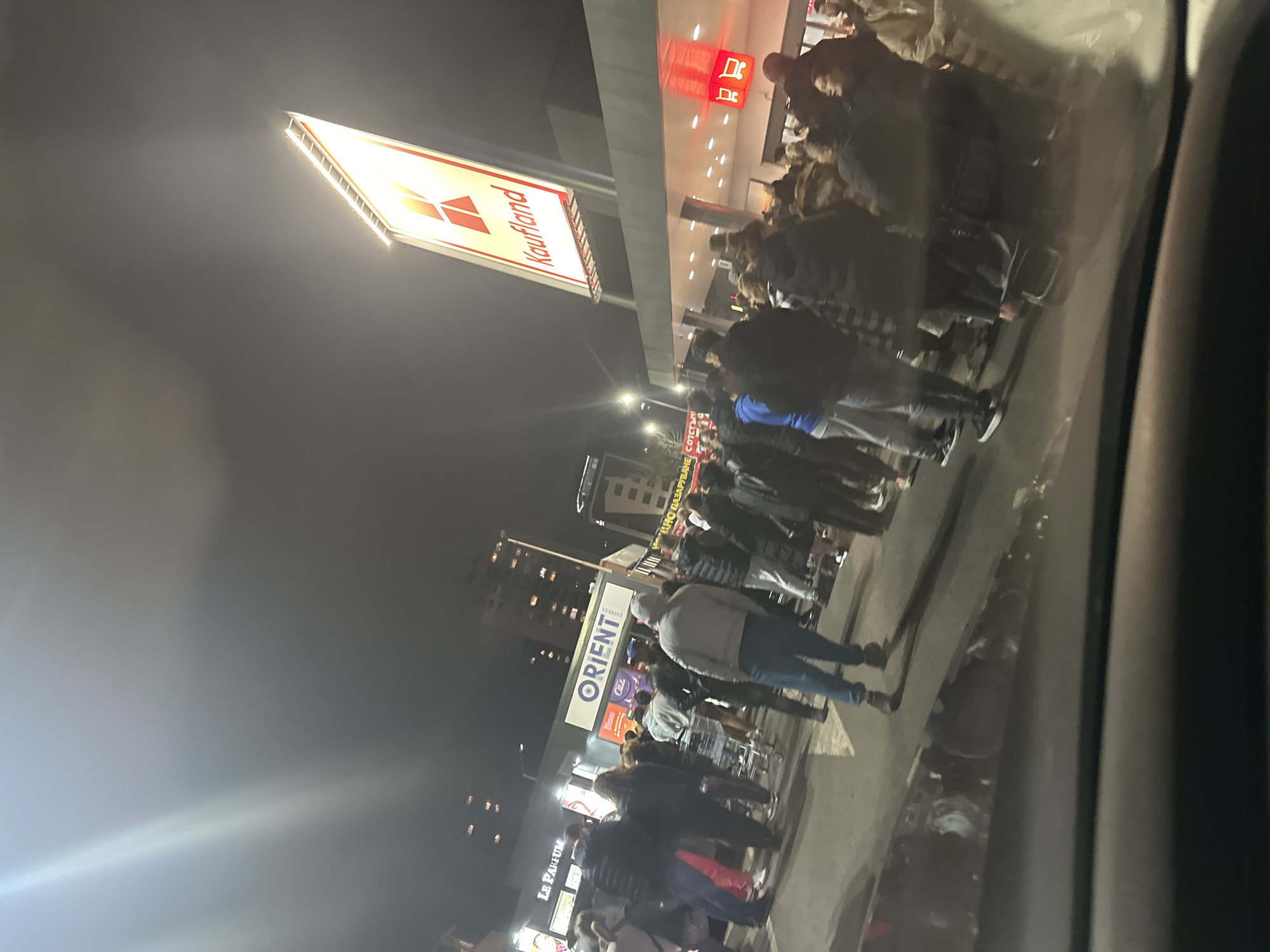 Crowd gathers outside Kaufland supermarket in Plovdiv evening