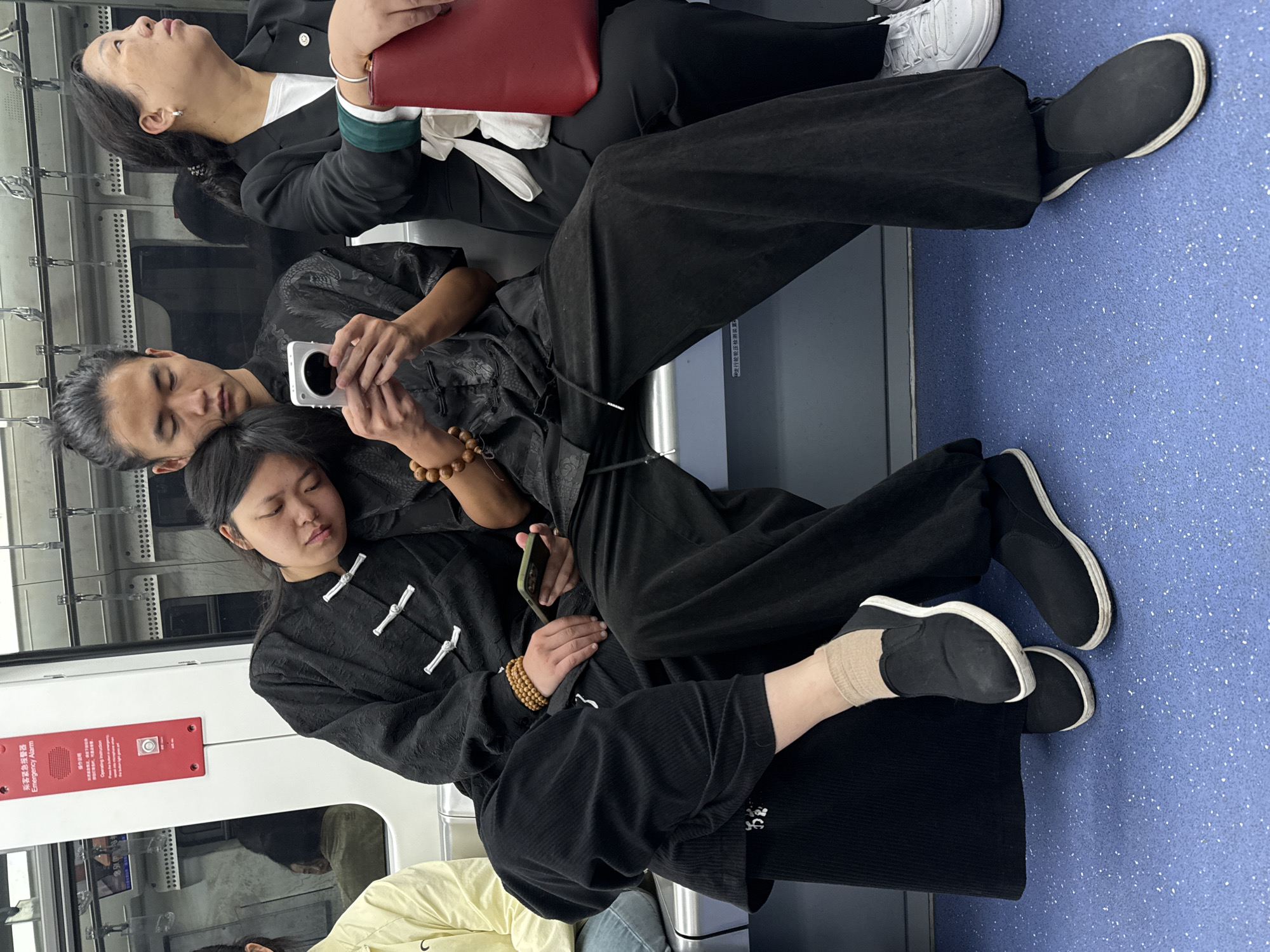 Late-night subway passengers observed in crowded Yuzhong District car