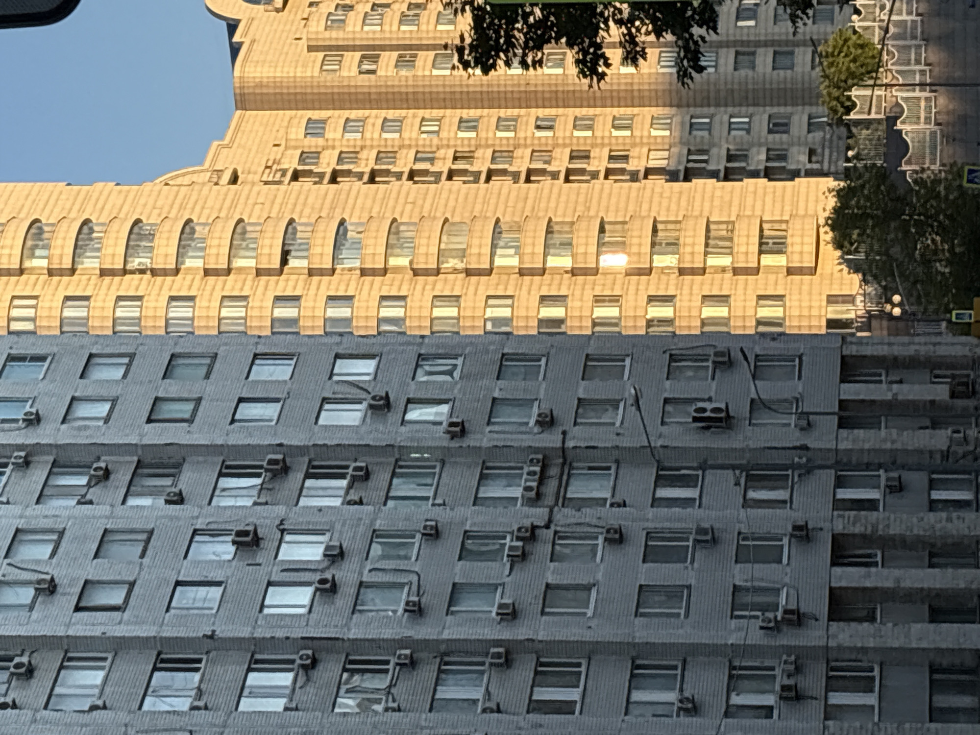 Urban architecture, golden domes, and city sunsets across an afternoon