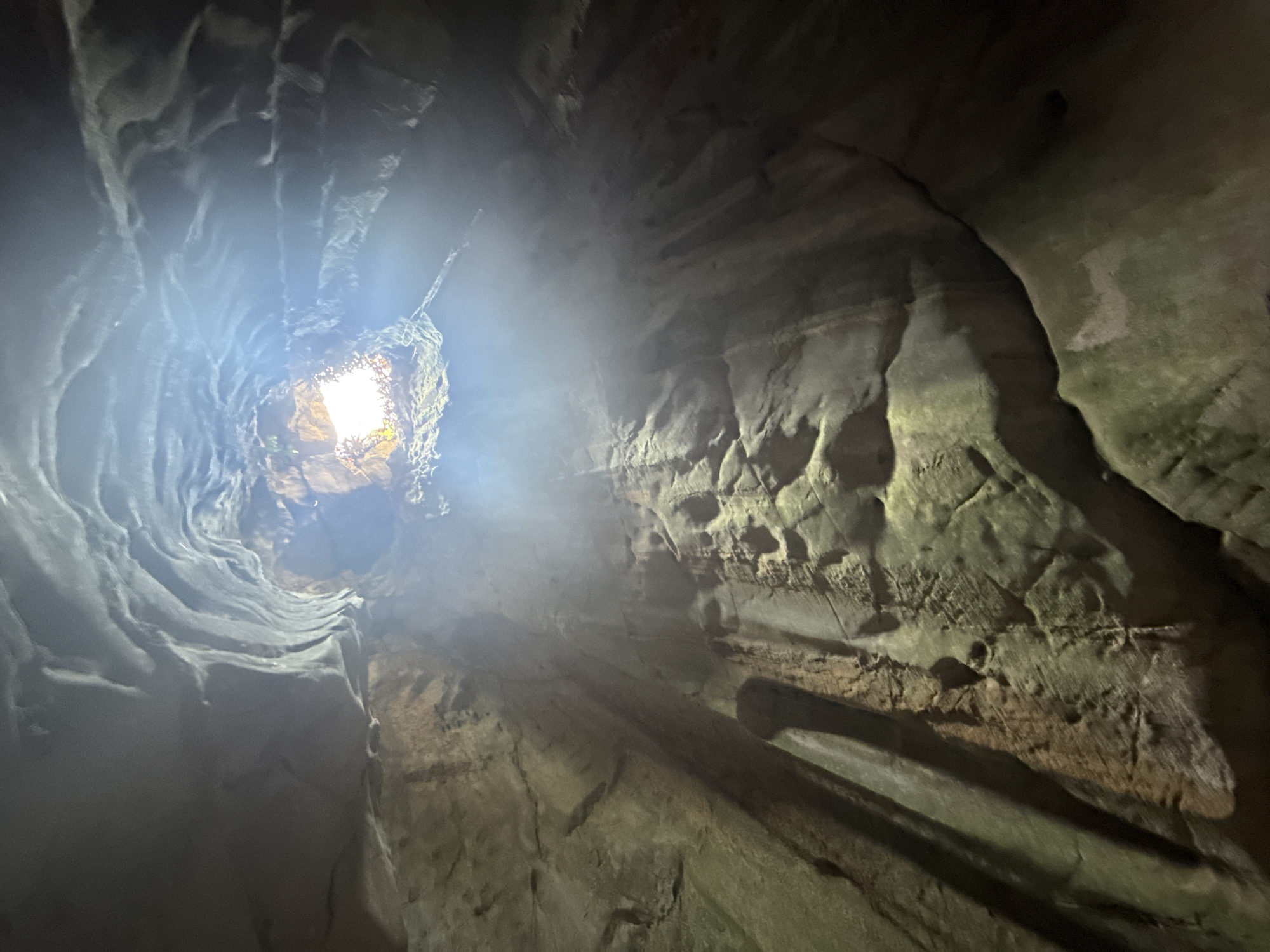 Cave opening photographed from below in Đà Nẵng