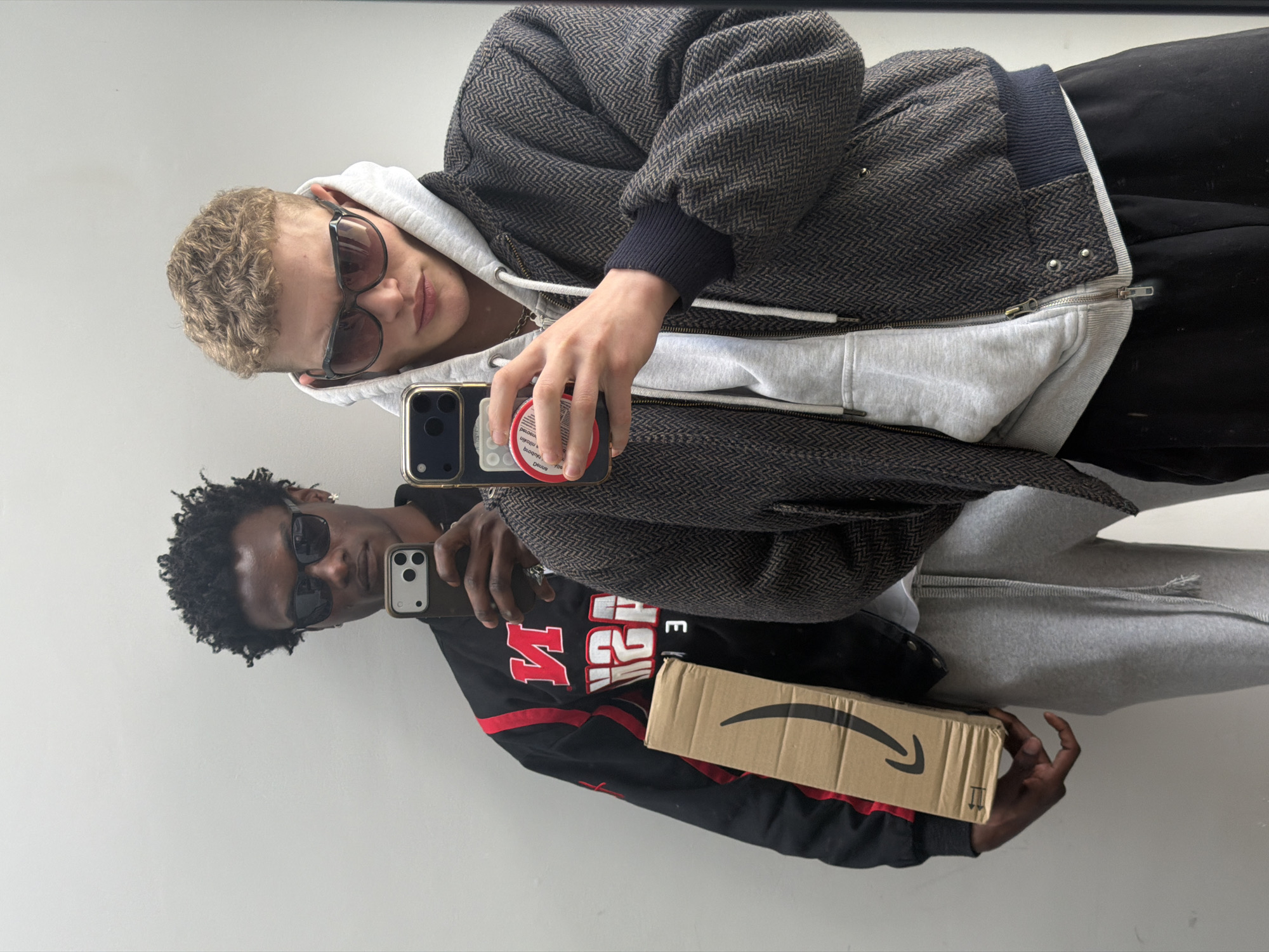 Mirror selfie captured of two individuals in London