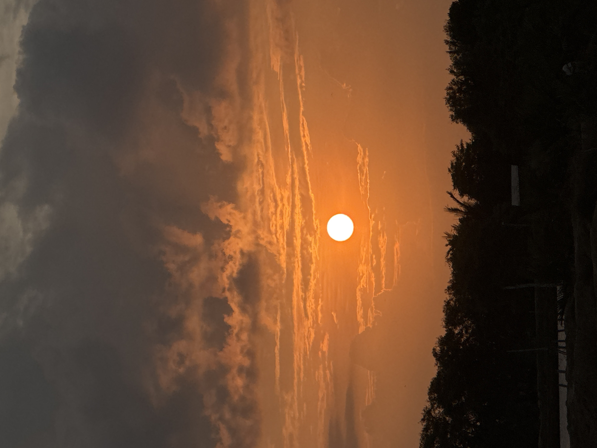 Dramatic coastal sunset seen from two spots in Aceh
