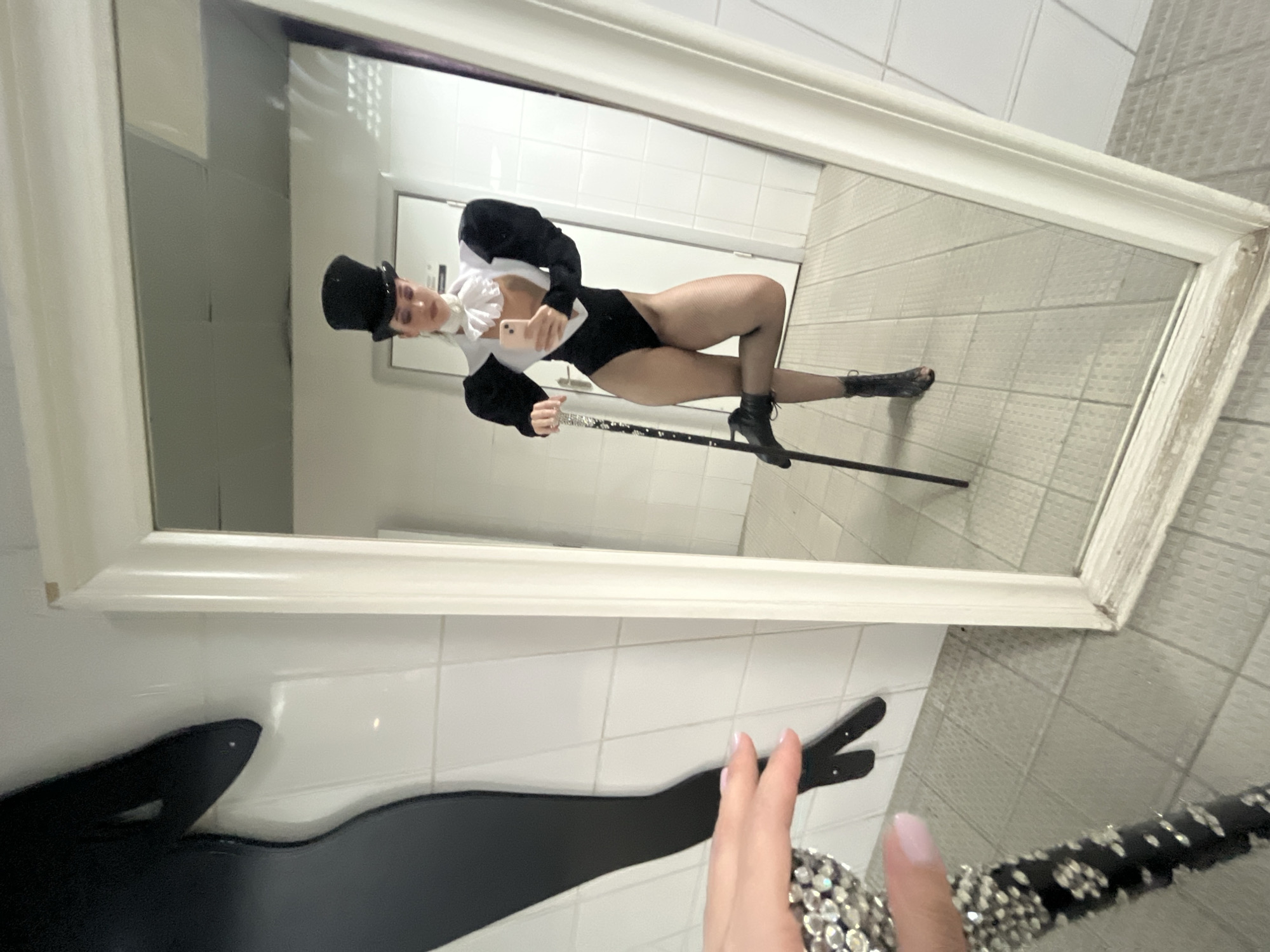 Person takes theatrical costume selfie with bejeweled cane in Kazan
