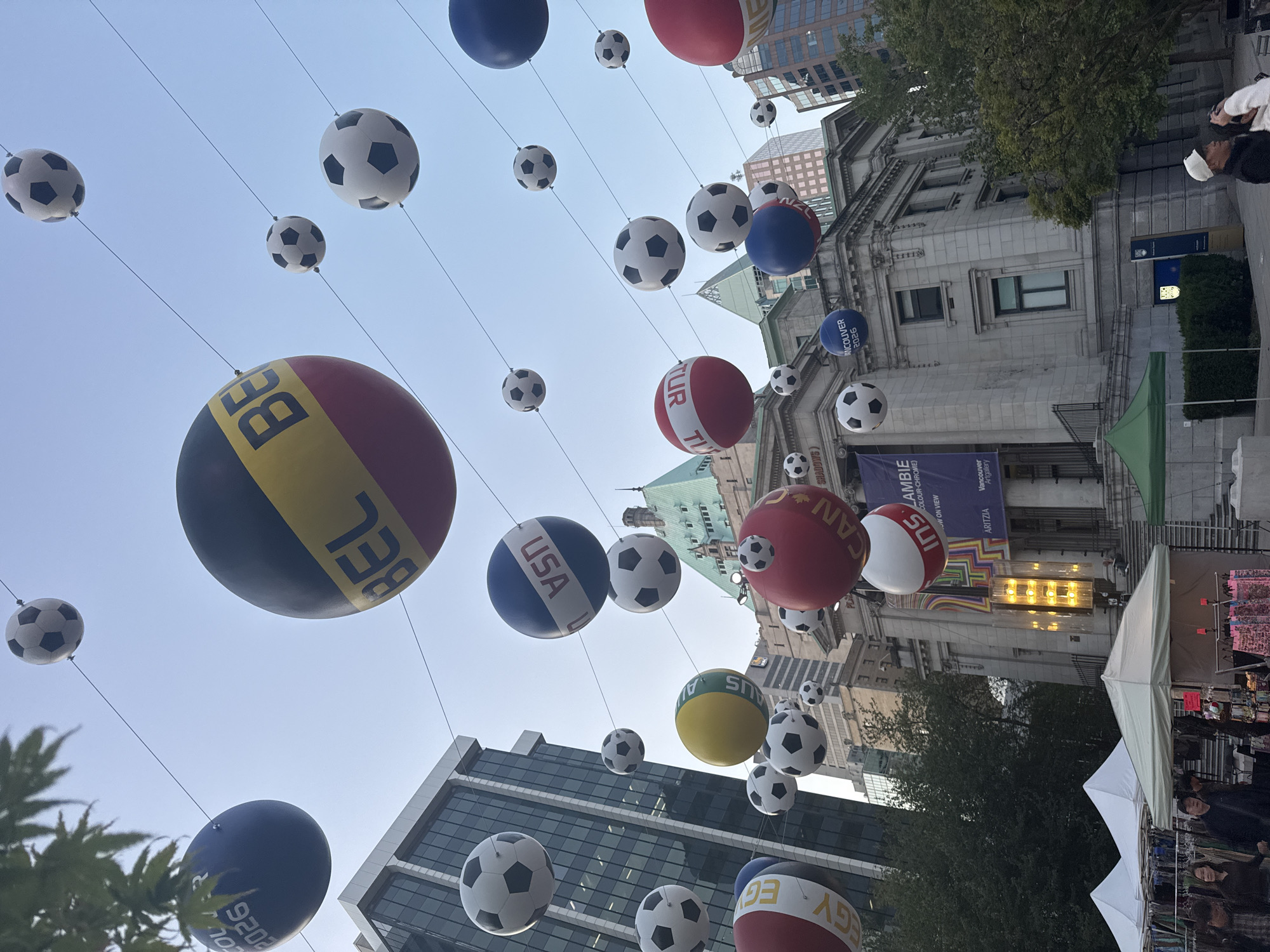 Soccer ball country display suspended over Vancouver street