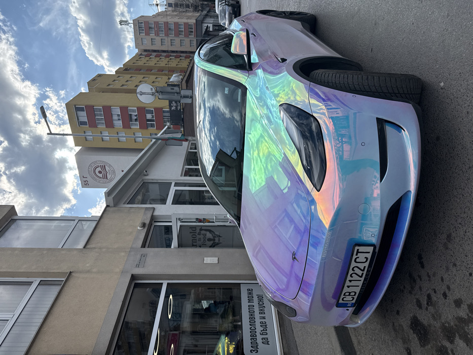 Spring day glimpses across Sofia include wrapped Tesla, blooms, gym
