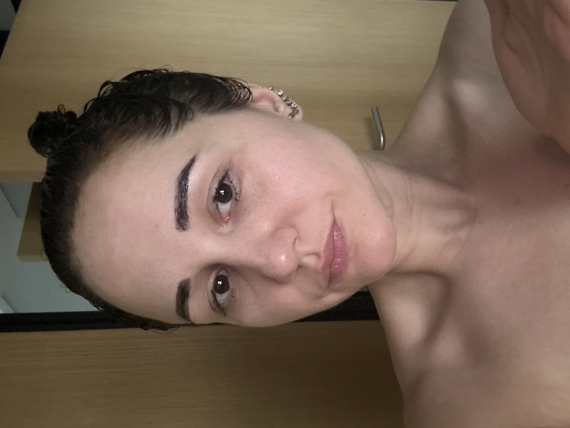 Woman captures quiet morning moments with selfies, cat in Dubai