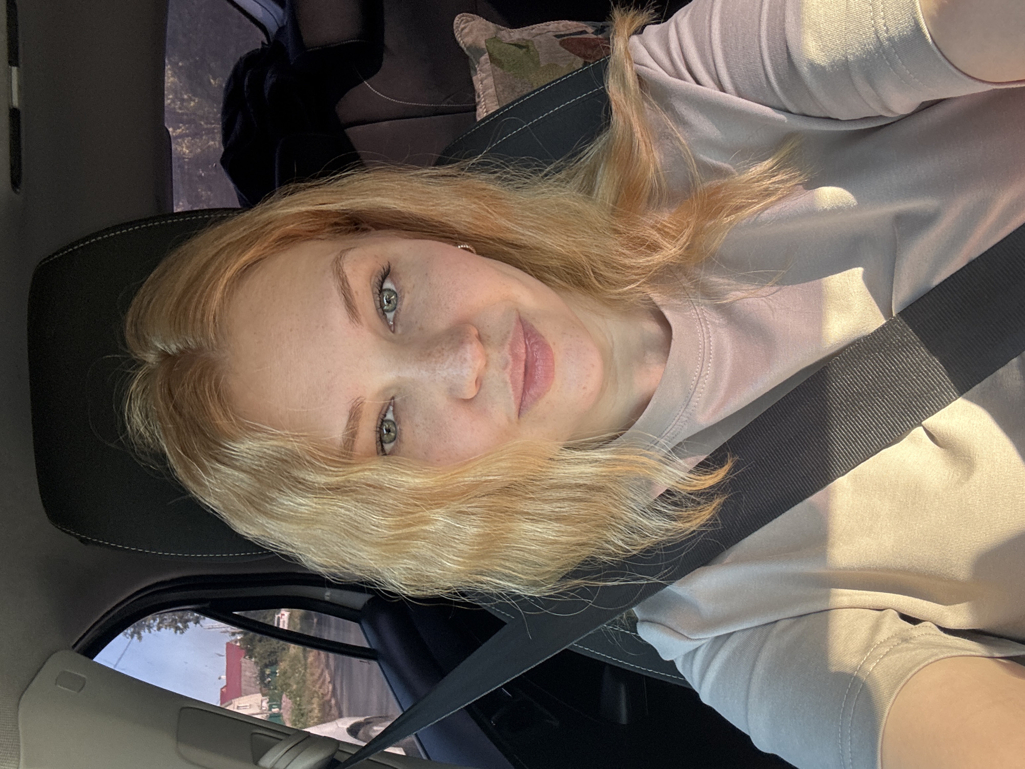 Quick driver's seat selfies on a road trip in rural Russia