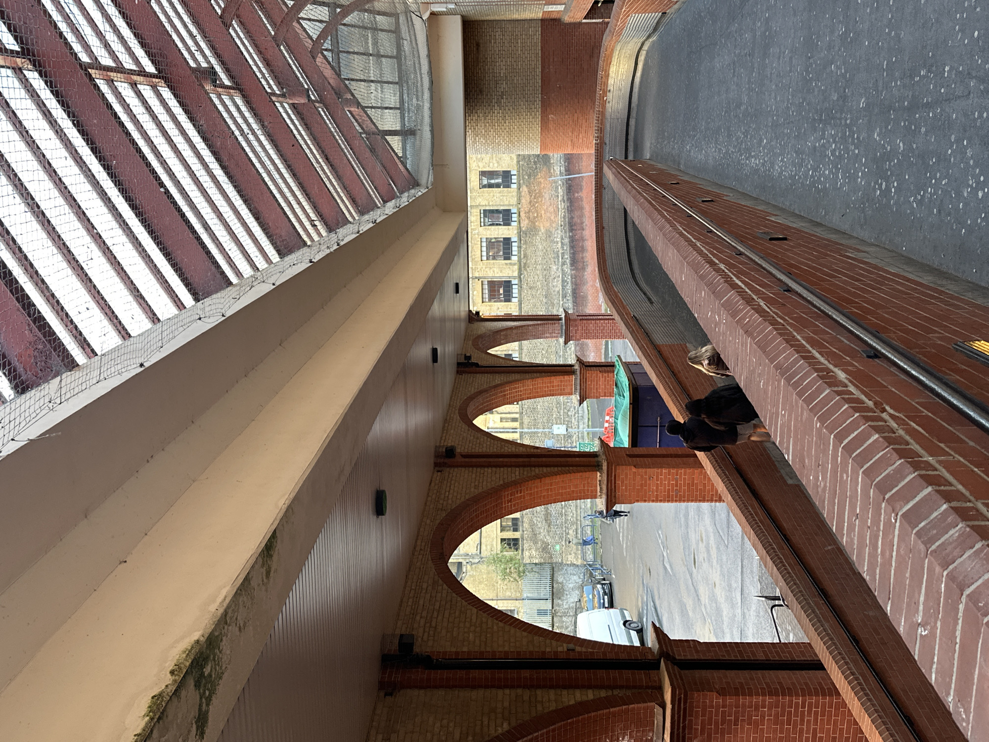 London shopping center walkway observed during evening hours